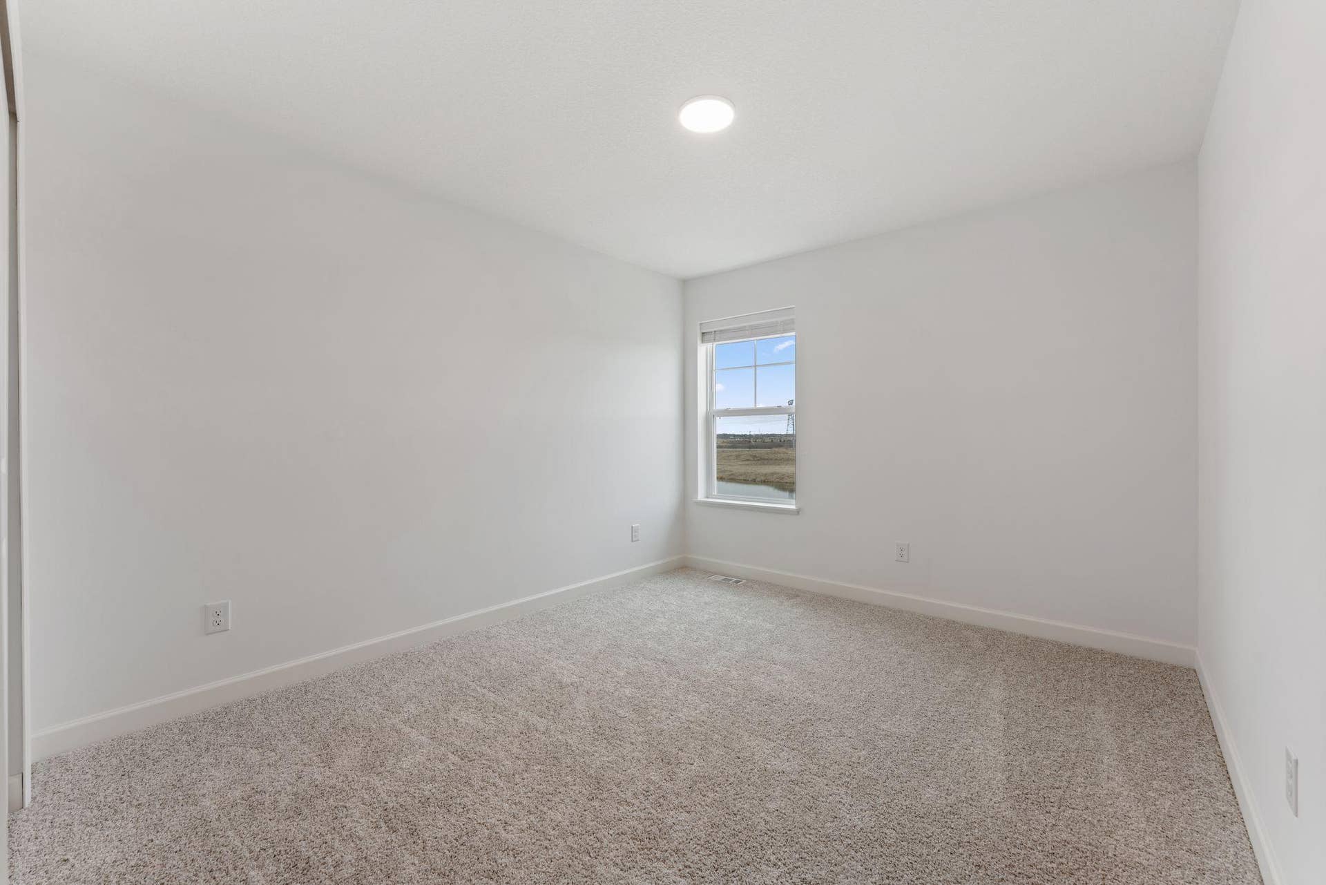 10564 Glacier Lane N, Maple Grove, MN 55369 (Photo of a similar home, actual finishes may vary) The two secondary bedrooms can be found on the top level to provide a quiet haven away from the bustling downstairs main living area.