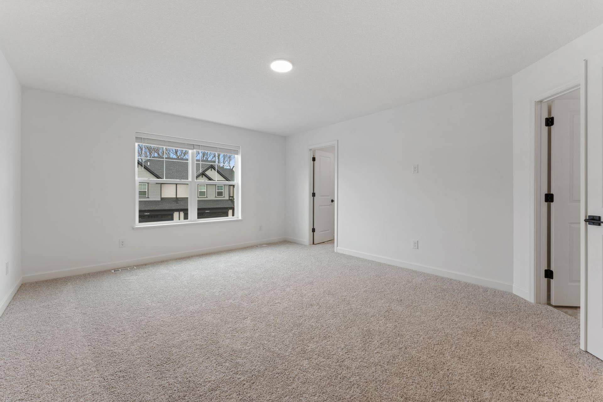 10564 Glacier Lane N, Maple Grove, MN 55369 (Photo of a similar home, actual finishes may vary) Perfect for rejuvenation and restoration, the owners suite boasts the largest bedroom in the home to provide restful nights, complete with an attached full-sized bathroom and large walk-in closet.