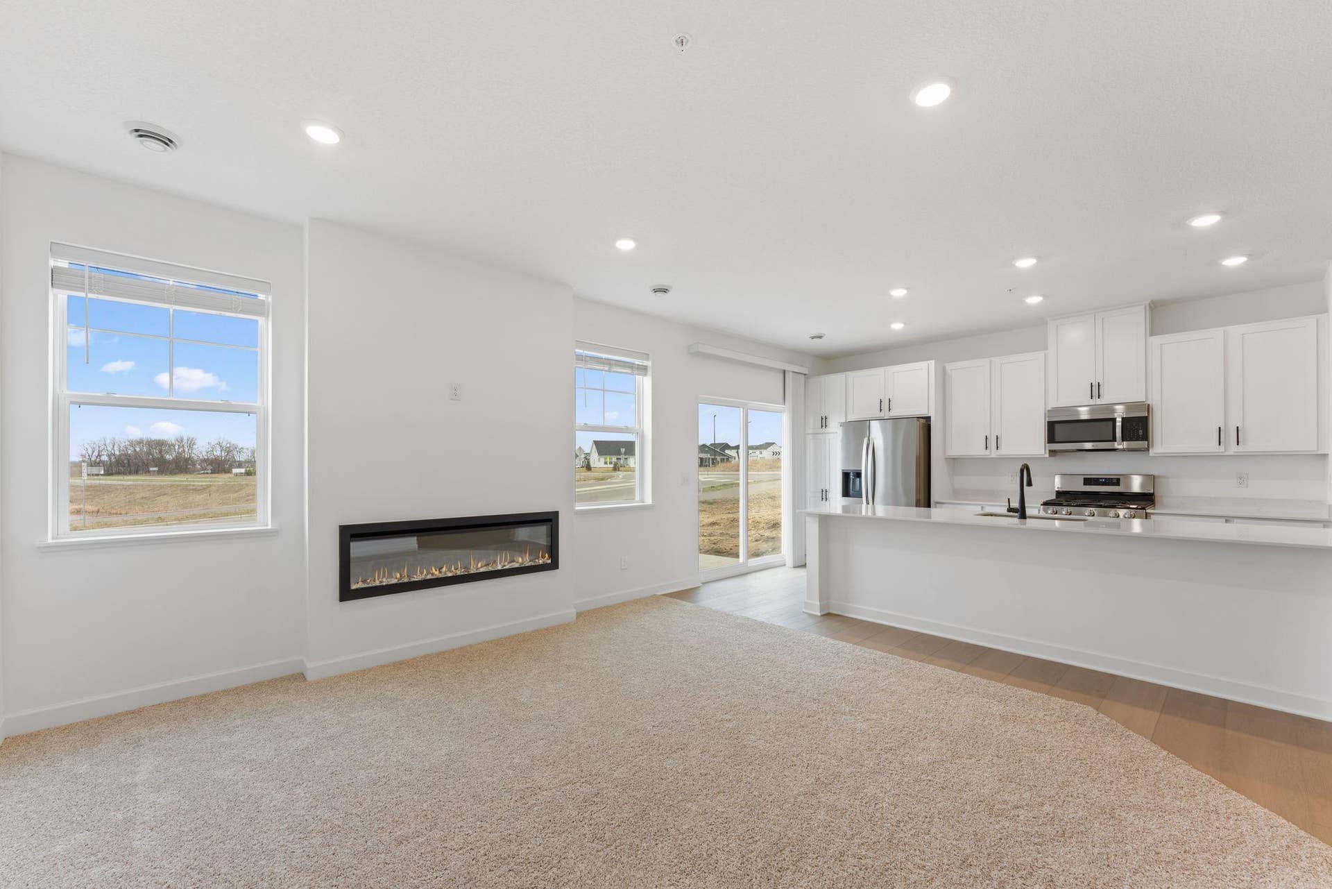 10564 Glacier Lane N, Maple Grove, MN 55369 (Photo of a similar home, actual finishes may vary) Residents can venture to the kitchen for quick snacks and drinks during movie marathons