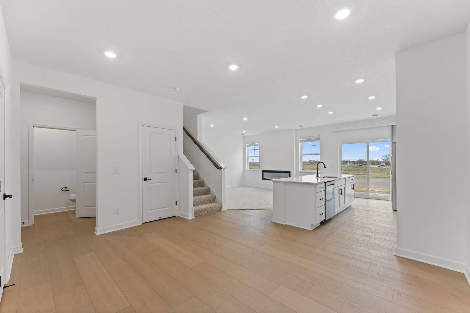 10564 Glacier Lane N, Maple Grove, MN 55369 (Photo of a similar home, actual finishes may vary) Sharing space with the kitchen, the modern dining area is great for serving piping-hot meals during intimate family dinners and holiday parties.