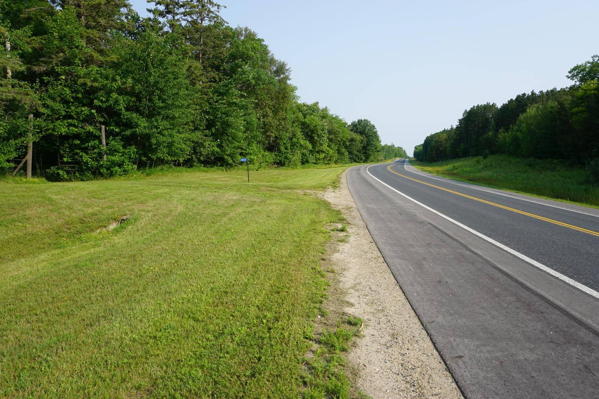 18421 Irvine Avenue NW, Bemidji, MN 56601 Paved Road Frontage 2.JPG