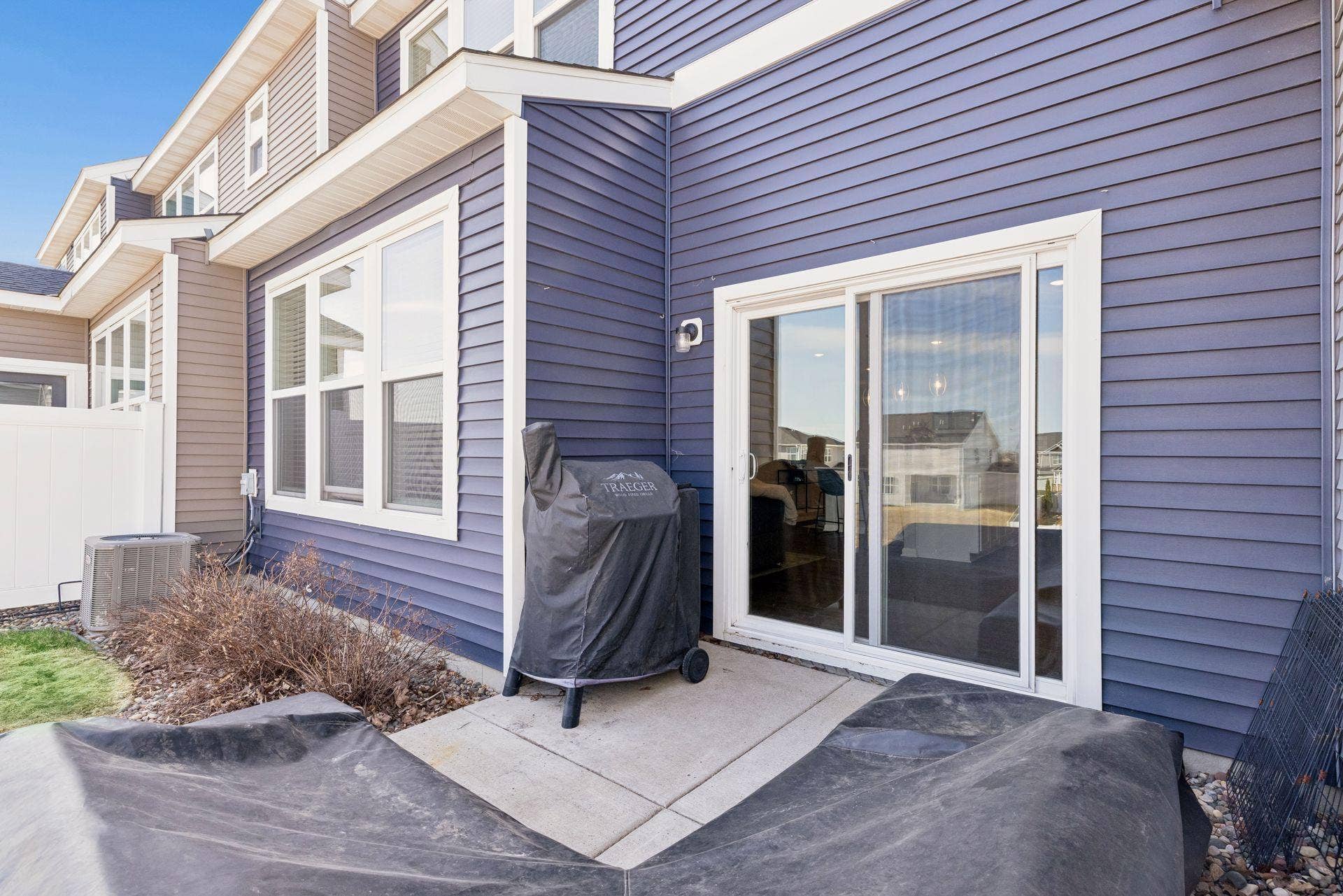 Private patio space ideal for outdoor seating and enjoying fresh air.