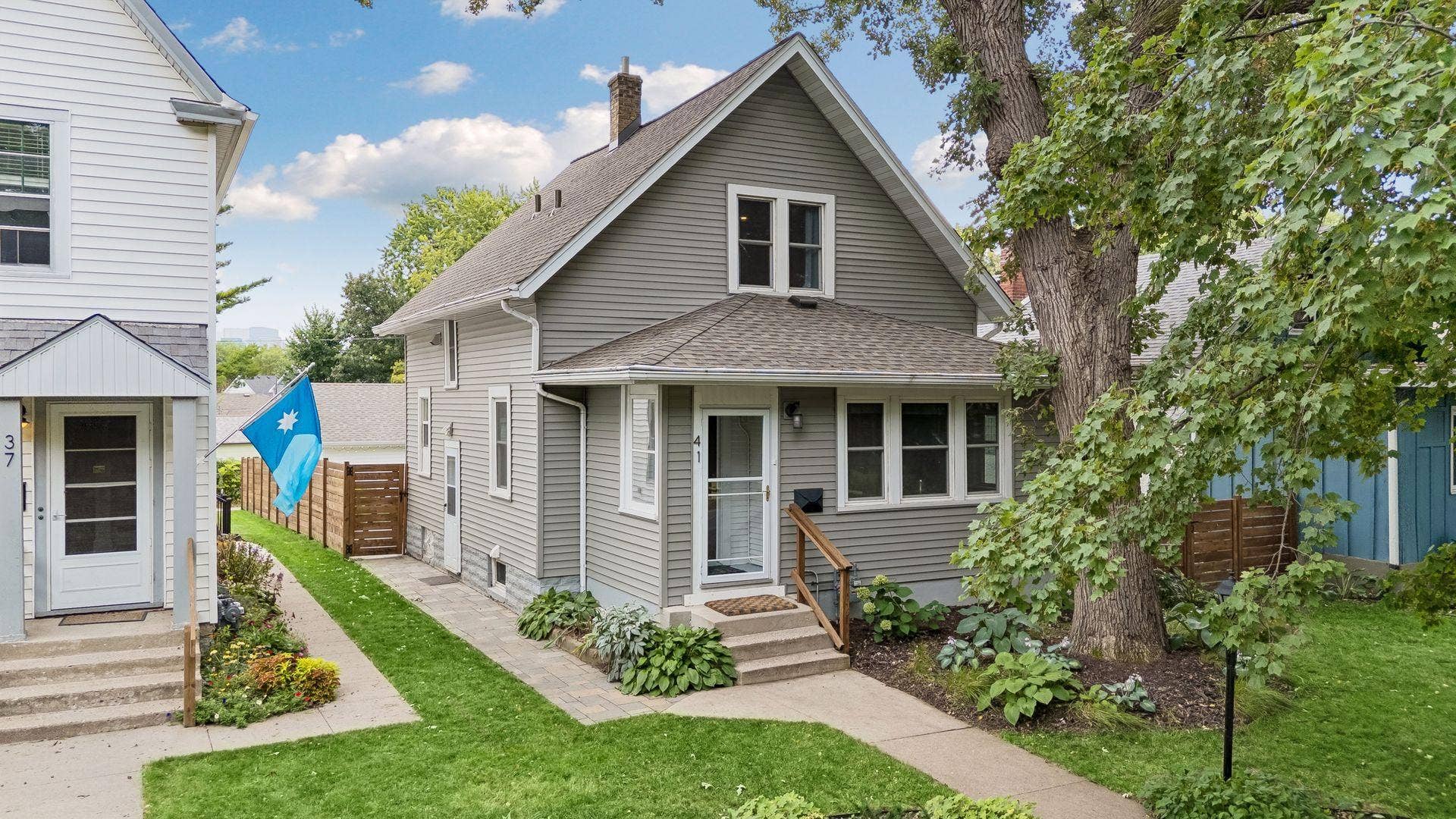 41 Oliver Avenue S, 7, Minneapolis, MN 55405 Classic Bryn Mawr charm from the start, framed by mature trees, perennial gardens and a home that feels tucked into its surroundings.
