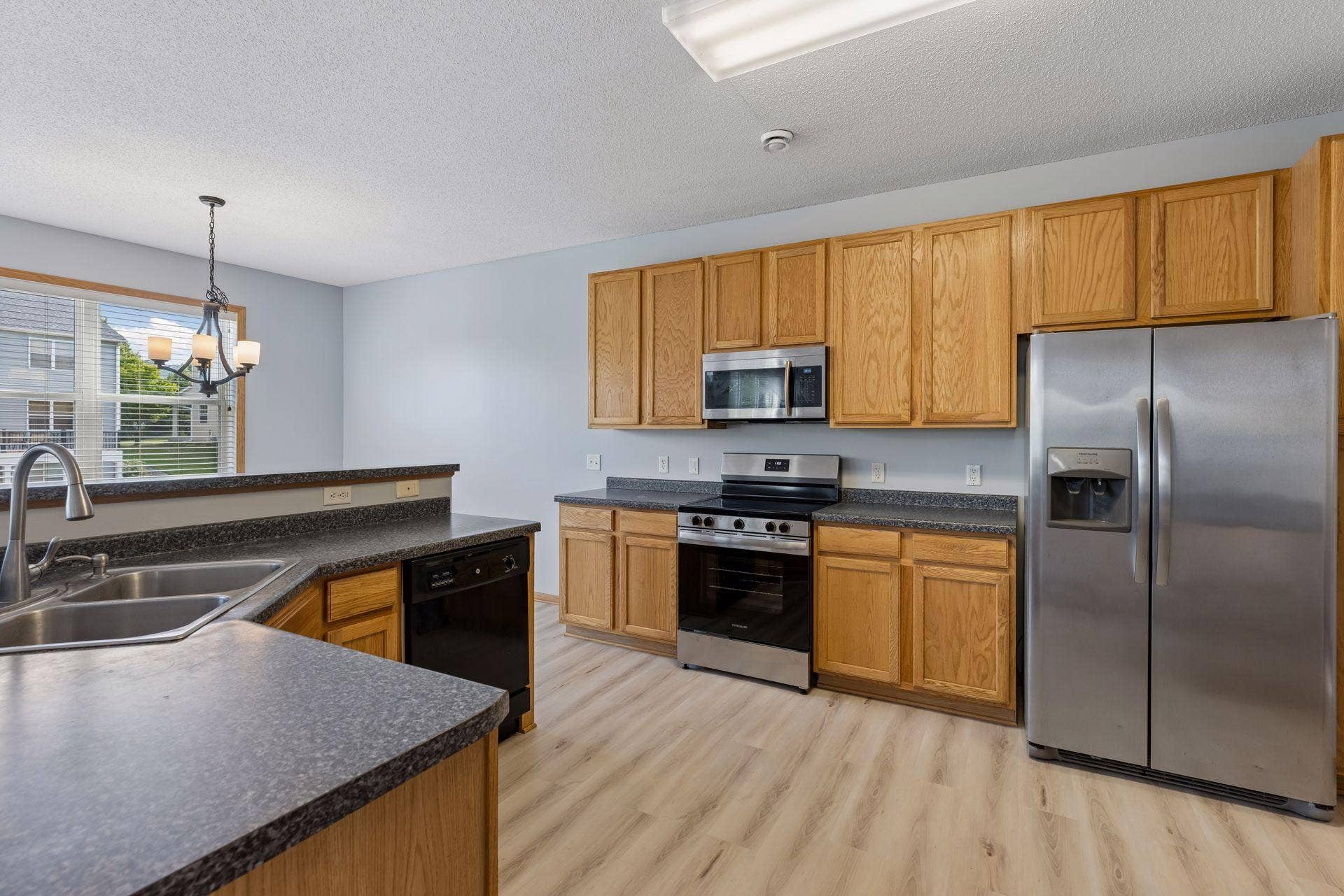 Spacious kitchen featuring a large center island.