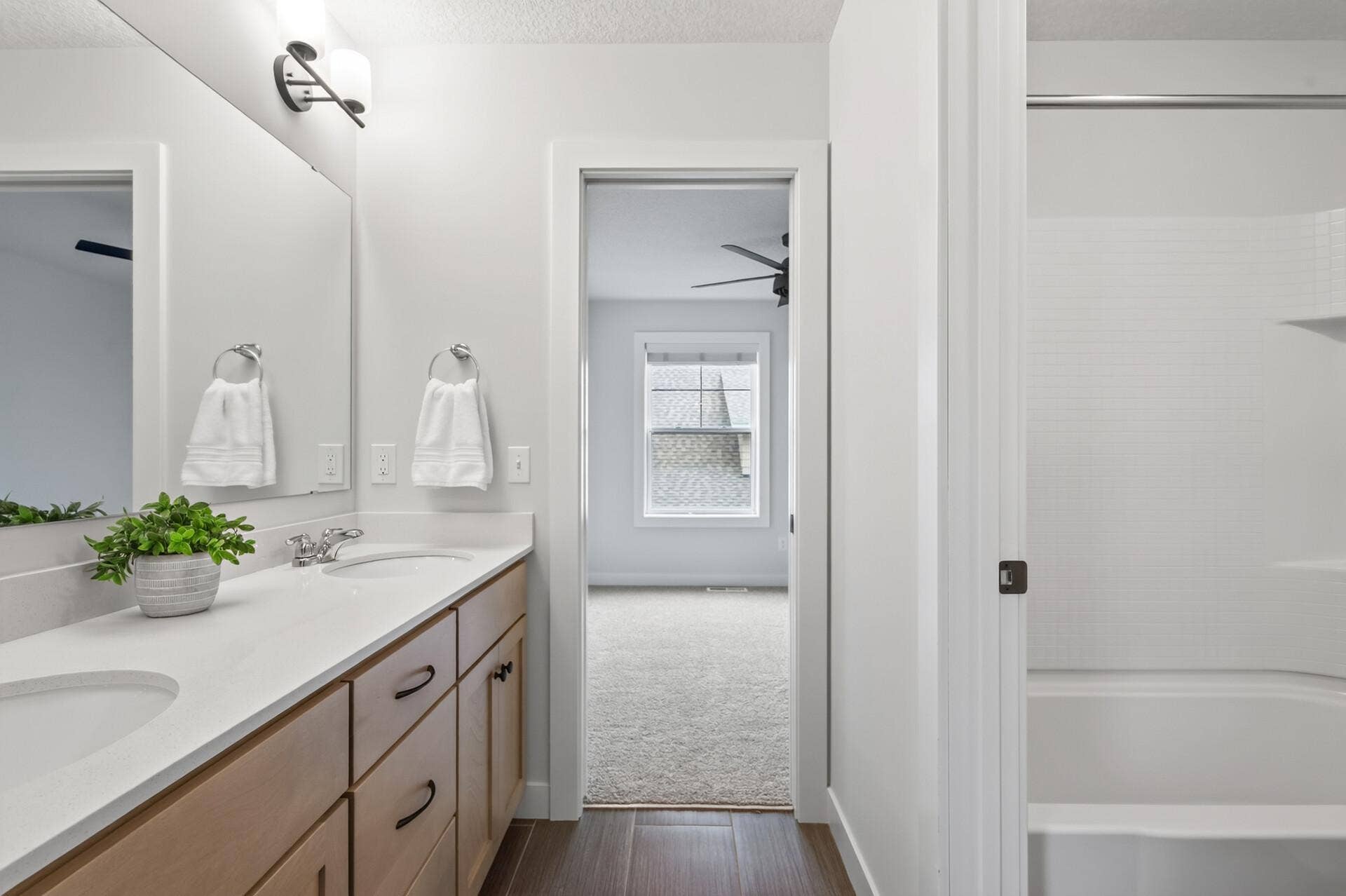 9960 Arrowwood Trail, Woodbury, MN 55129 Dual sinks in this Jack-n-Jill bathroom