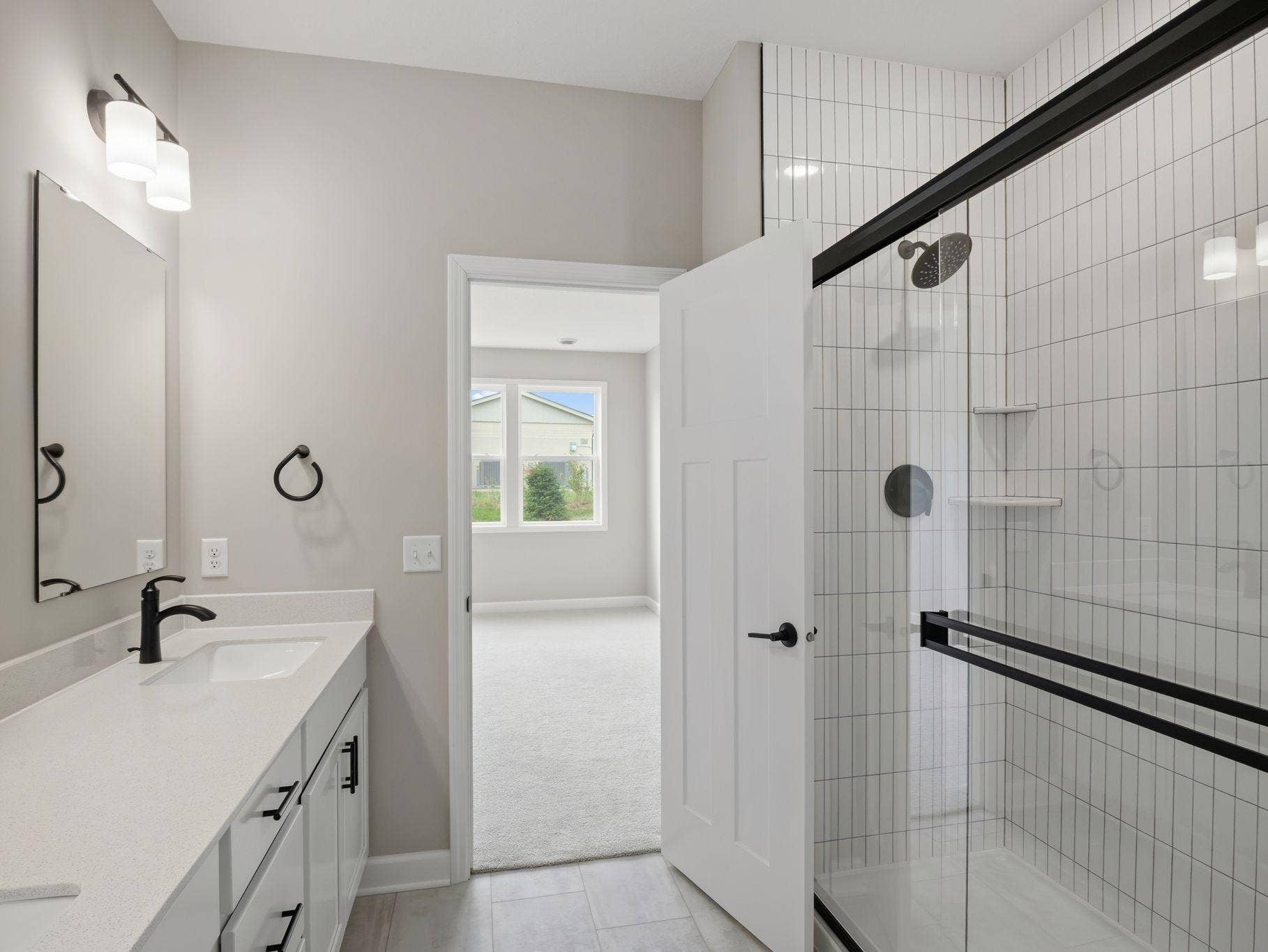 16_MIN_Westwind_Pic_Salerno_QMI_HS3521_OwnersBathroom_2of2_F1.jpg