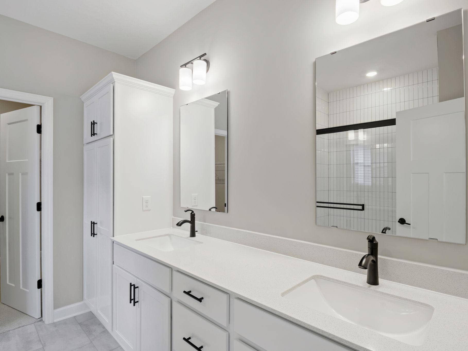 This oversized vanity features optimal dual sinks and twin mirrors to streamline getting-ready routines