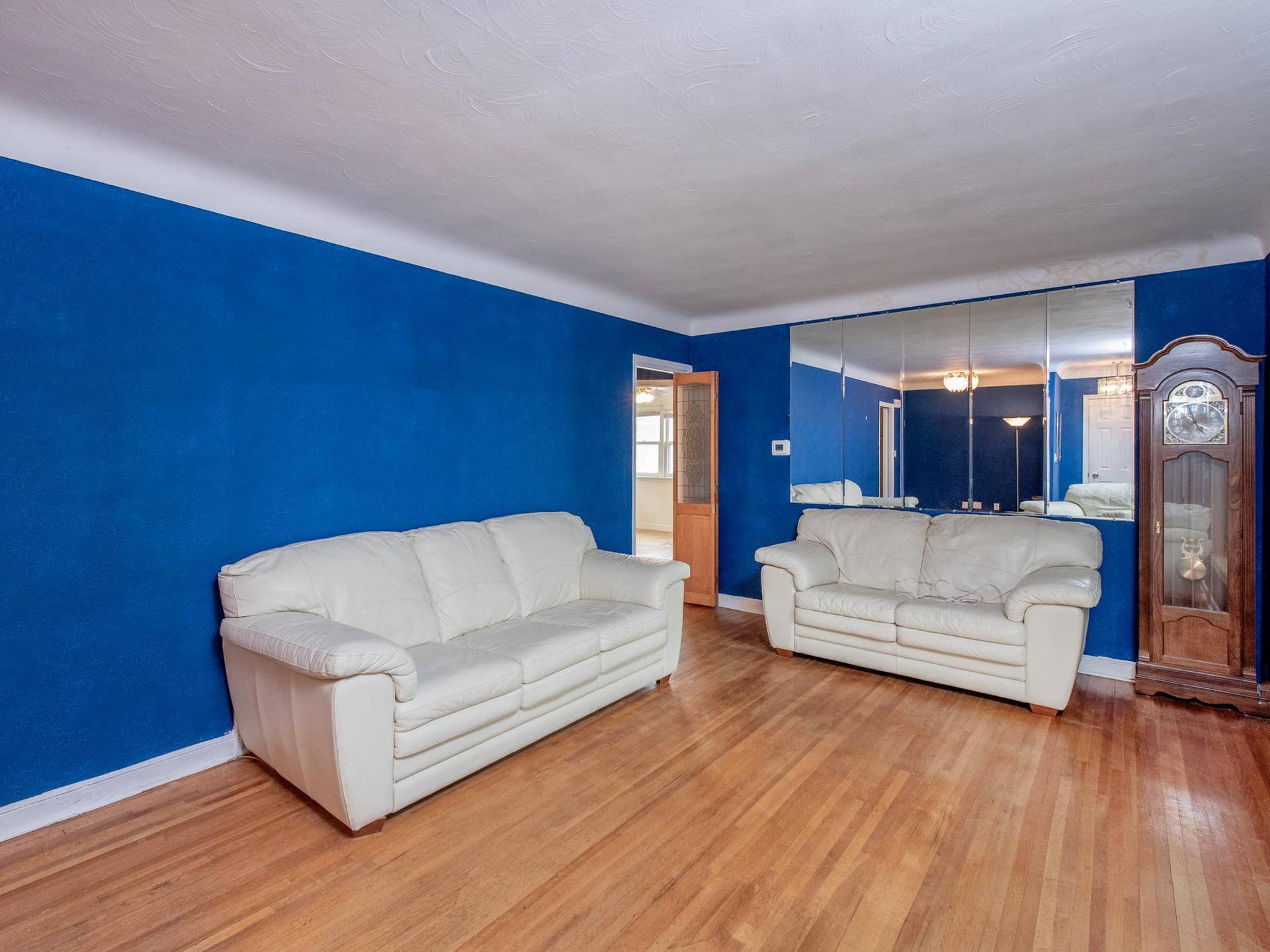 Living room with hardwood floors...