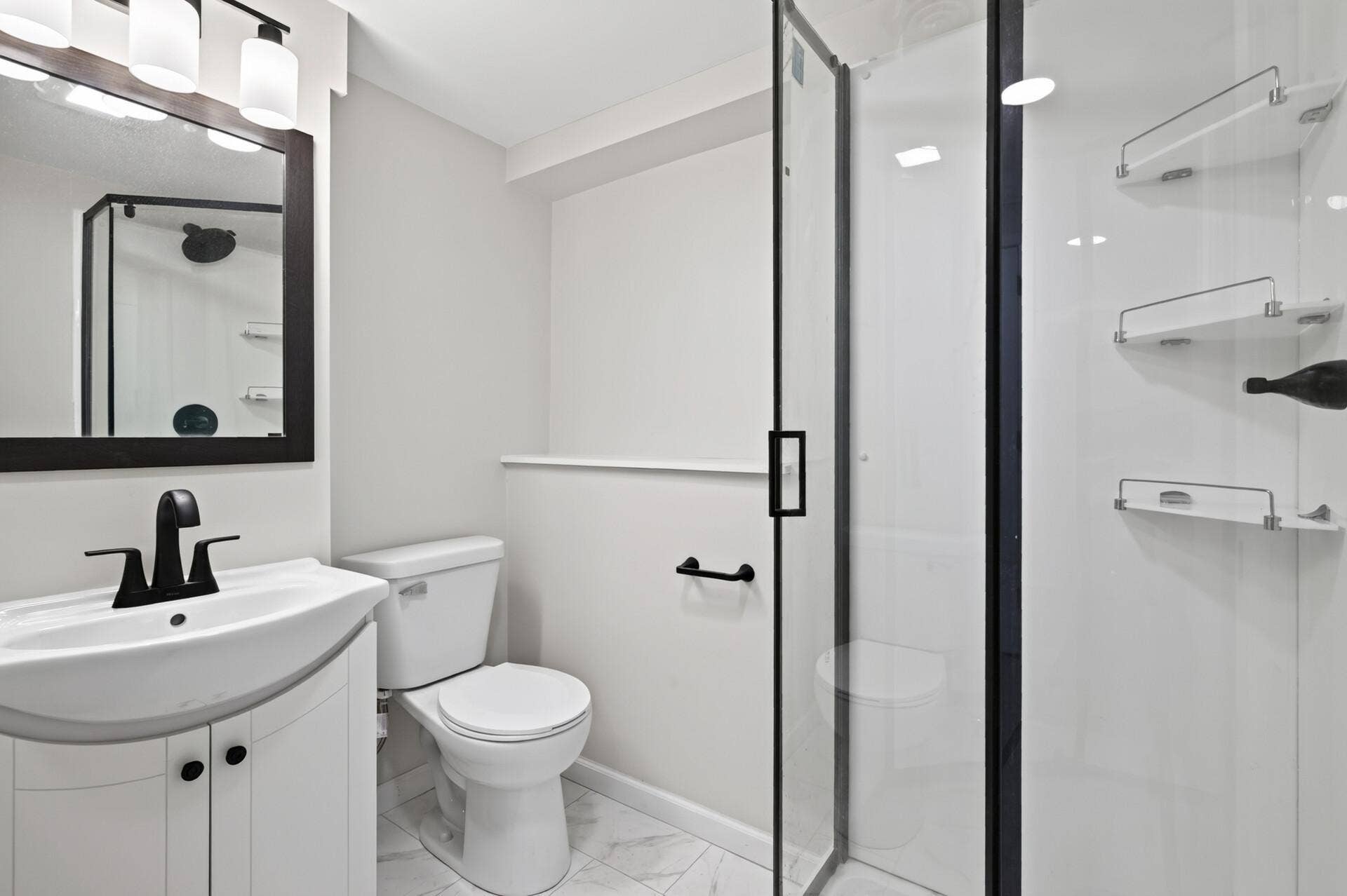 8444 Brunswick Court N, Brooklyn Park, MN 55443 Lower level bathroom all renovated! 3/4 bath!