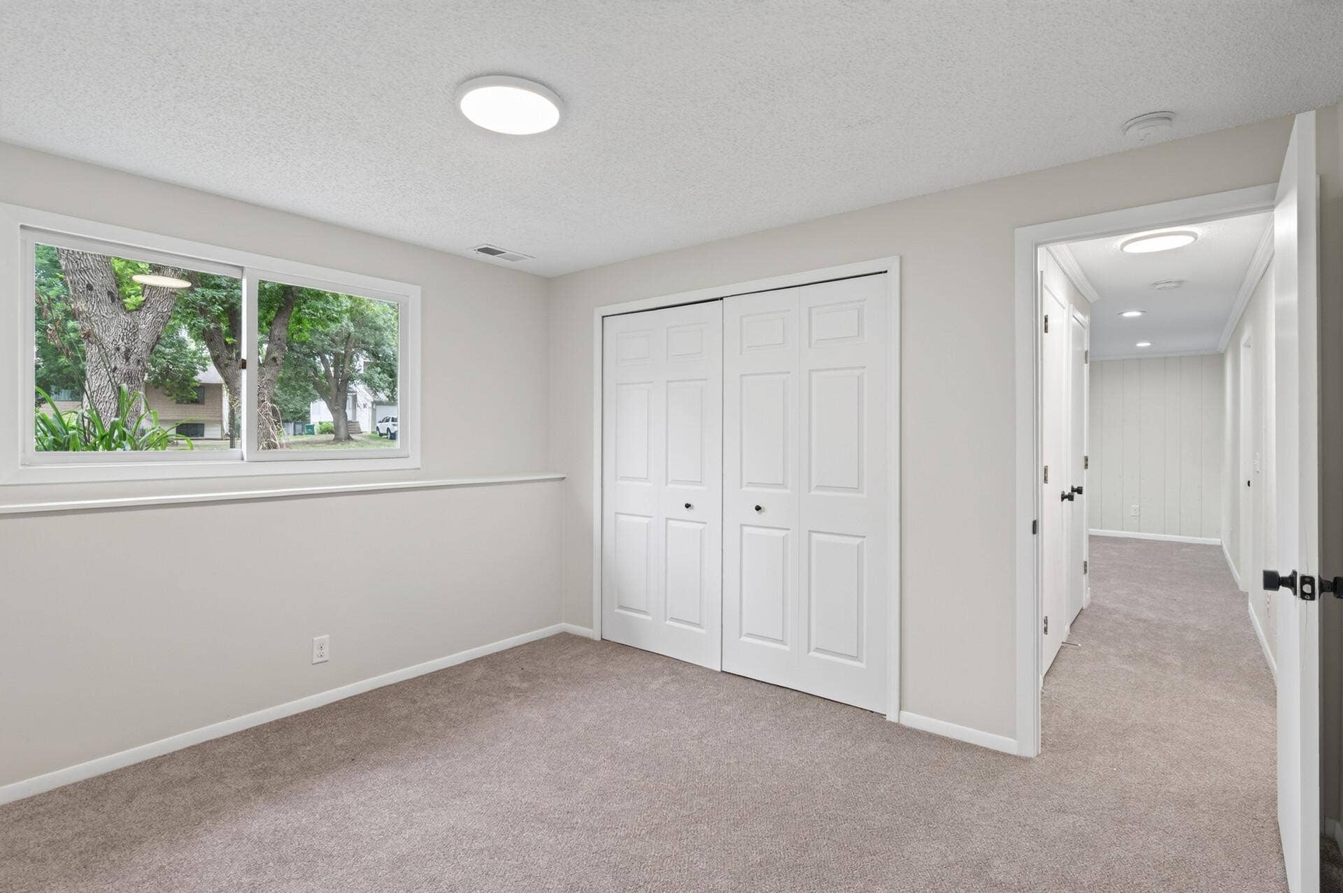8444 Brunswick Court N, Brooklyn Park, MN 55443 Two bedrooms located in the lower level!