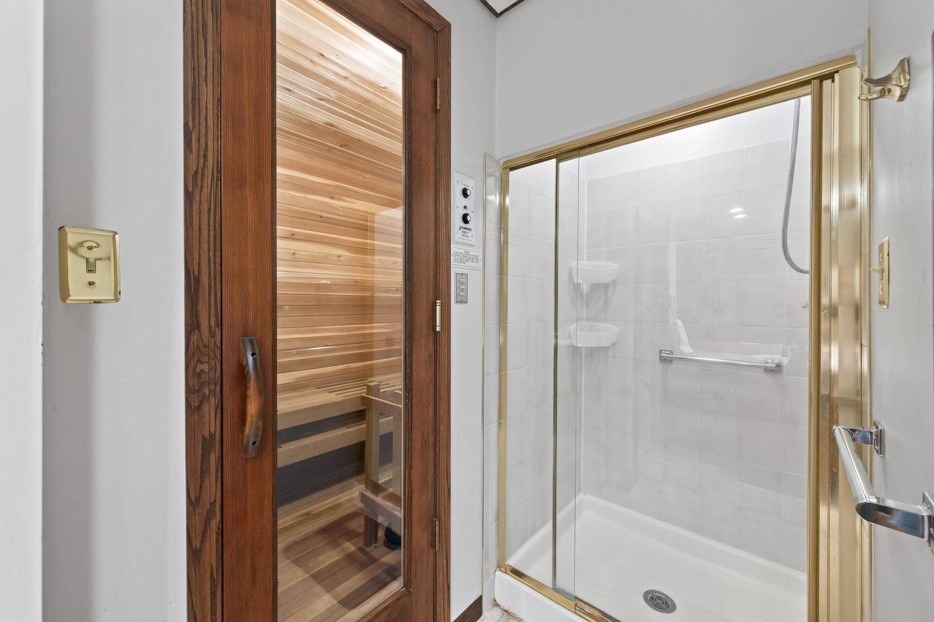 3800 101st Avenue N, Brooklyn Park, MN 55443 The lower level bath shower and sauna.