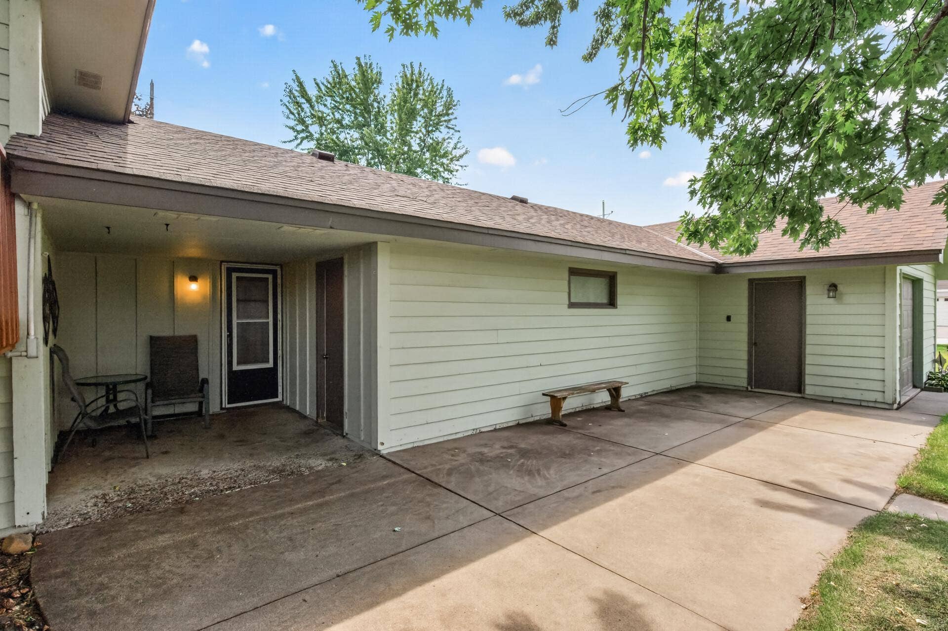 3800 101st Avenue N, Brooklyn Park, MN 55443 There is a back porch off the foyer/garage area's.