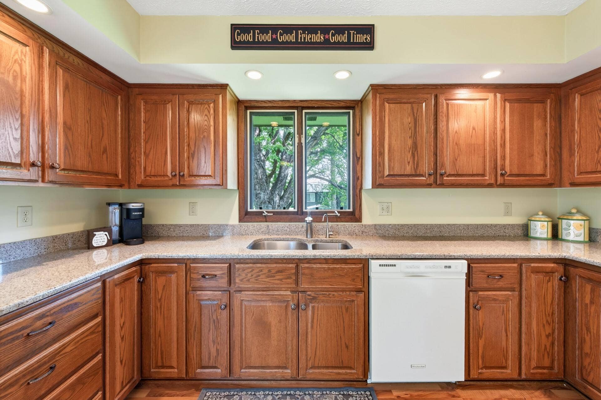 3800 101st Avenue N, Brooklyn Park, MN 55443 Easy care laminate floor in the kitchen, solid surface countertops with an undermount sink and recessed lighting.