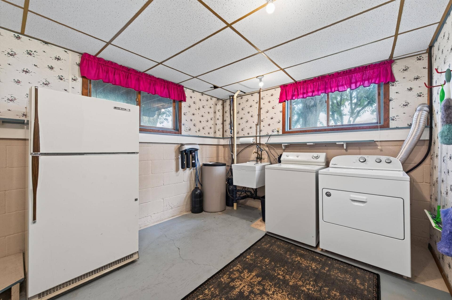 3800 101st Avenue N, Brooklyn Park, MN 55443 Bright and cheery laundry room in the lower level. The seller will be leaving the washer, dryer and extra refrigerator.