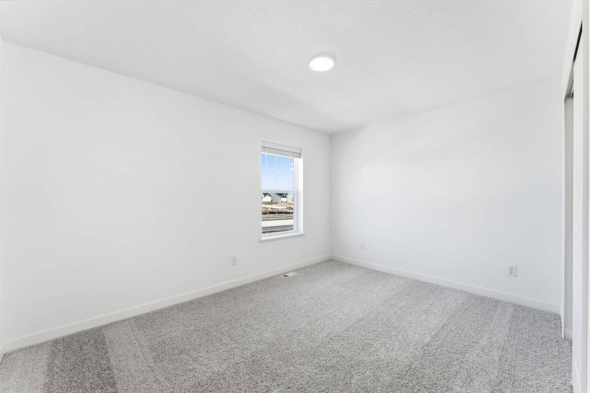 10551 Harbor Lane N, Maple Grove, MN 55369 (Photo of a similar home, actual finishes may vary) Each secondary bedroom includes premium wall-to-wall carpeting with 6 lb padding for enhanced comfort and a convenient closet
