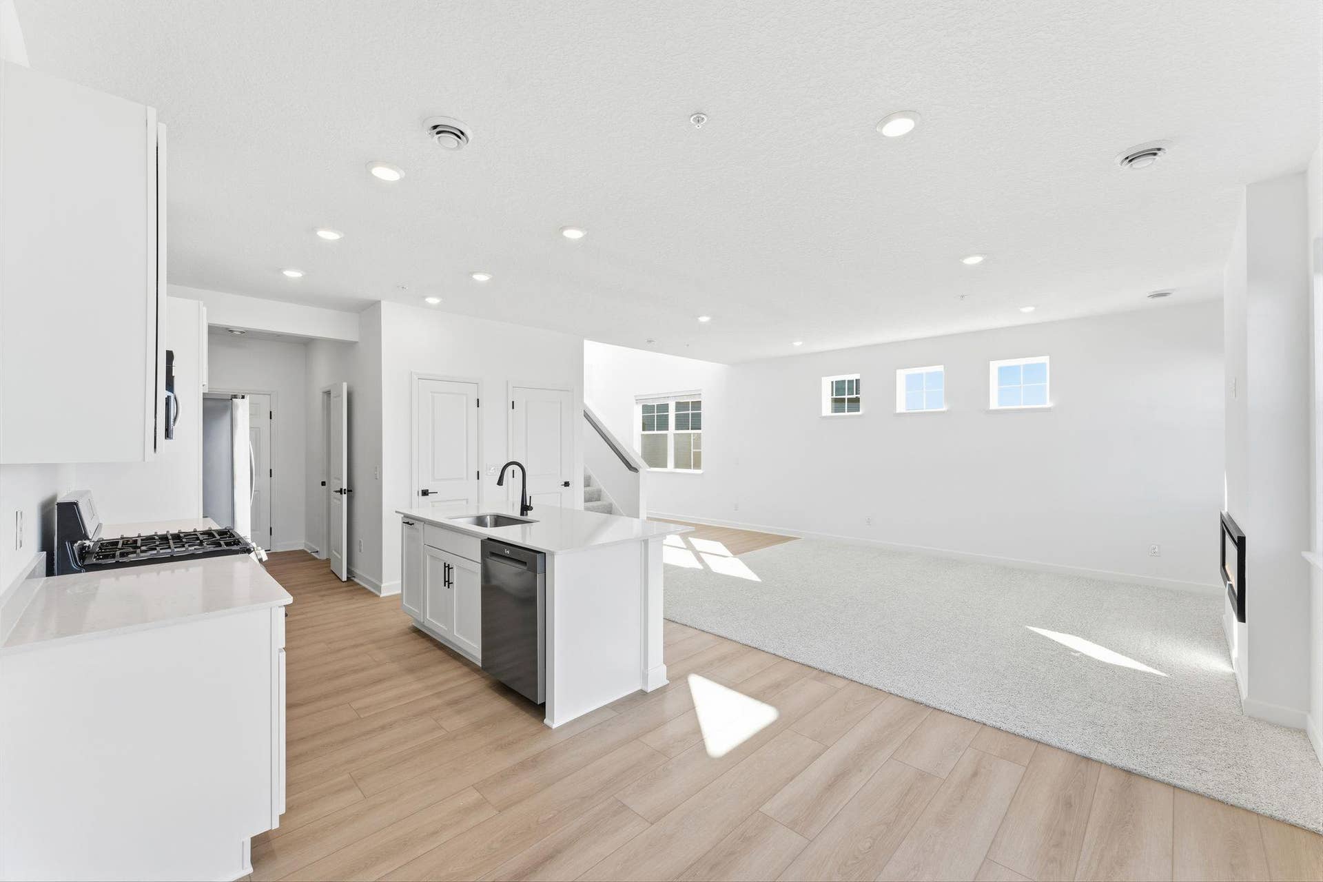 10551 Harbor Lane N, Maple Grove, MN 55369 (Photo of a similar home, actual finishes may vary) The dining room enjoys direct access to the patio for seamless indoor-outdoor parties