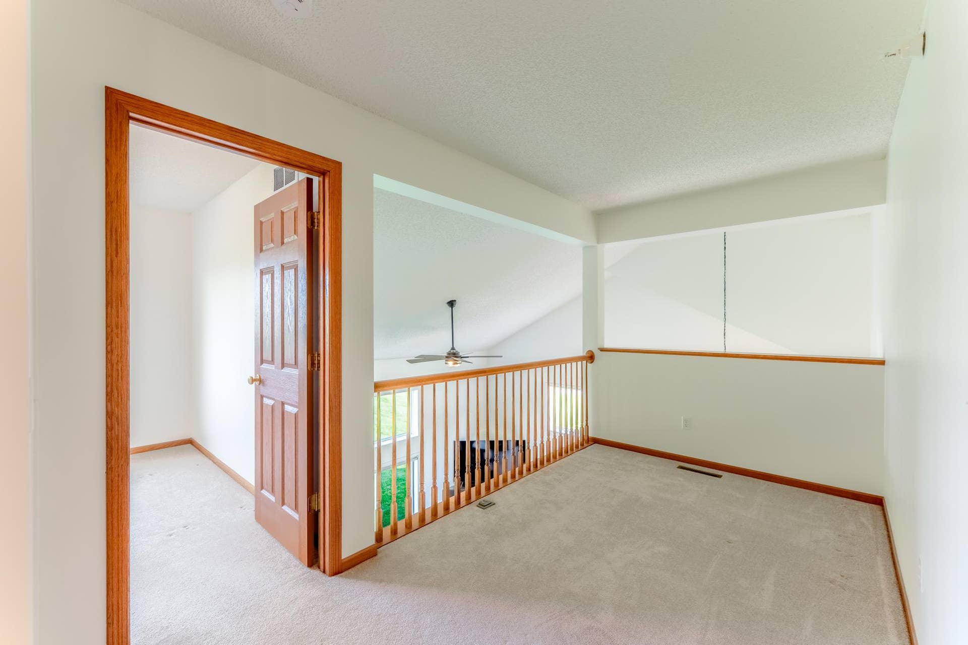 The loft is perfect for a small office space or reading nook.