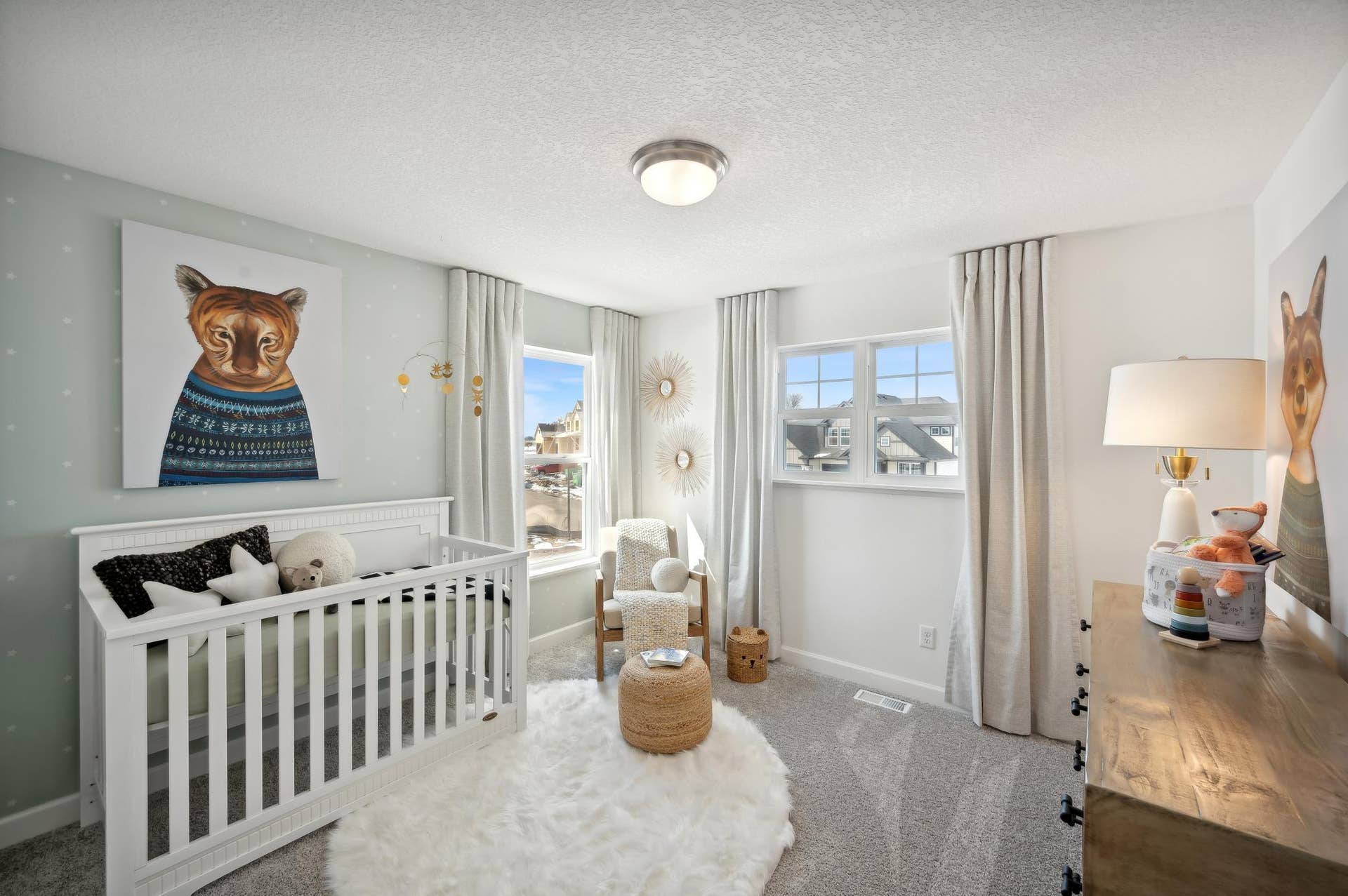 (Photo of model home, finishes will vary) One of the three generously sized upper level secondary bedroom with a spacious closet.