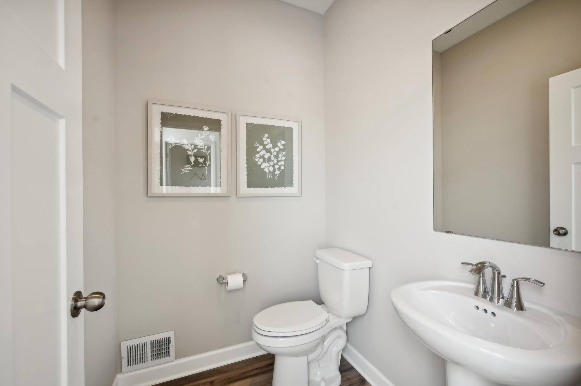 (Photo of model home, finishes will vary) A powder bath located on the main floor!