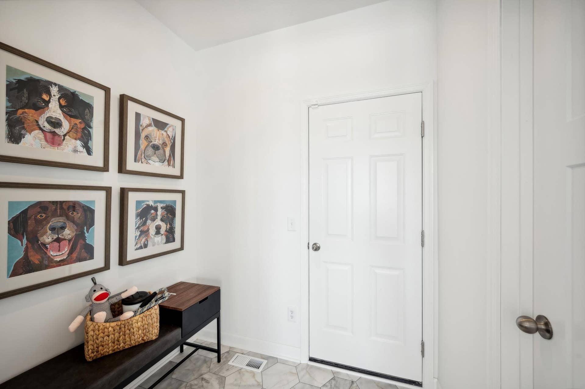 (Photo of model home, finishes will vary) A mudroom to keep you organized!