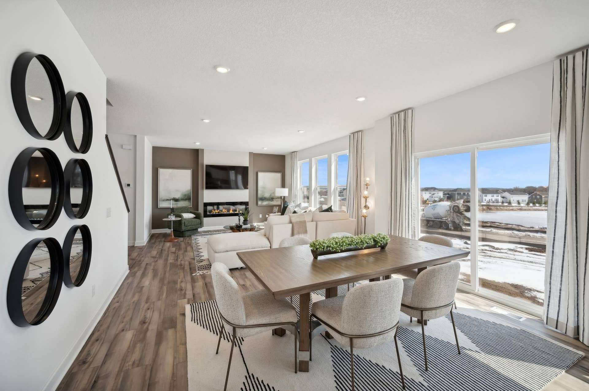 (Photo of model home, finishes will vary) Adjacent to the kitchen is a dinning area to enjoy meals with family and friends!