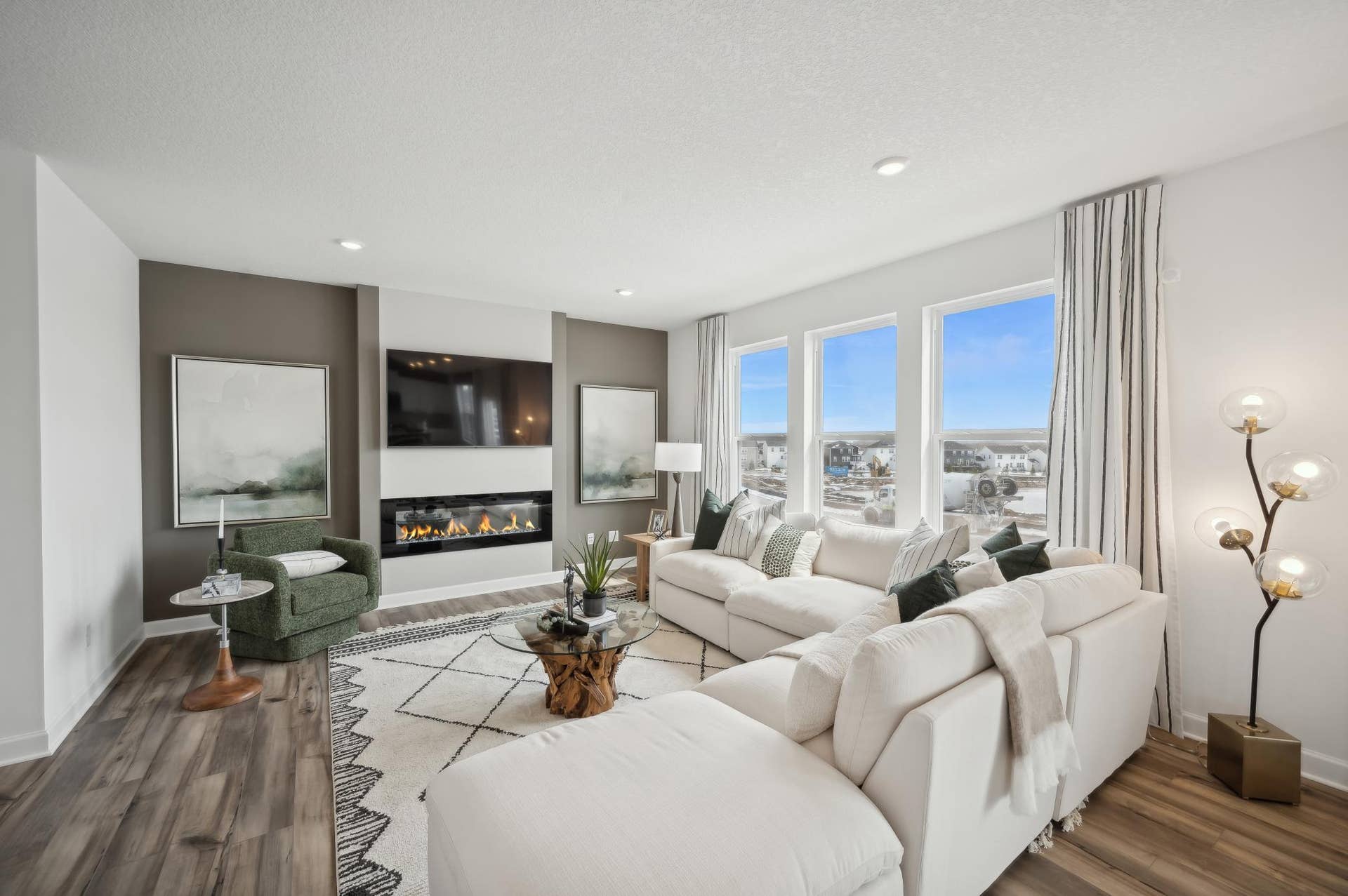 (Photo of model home, finishes will vary) Another angle of this bright and spacious family room!