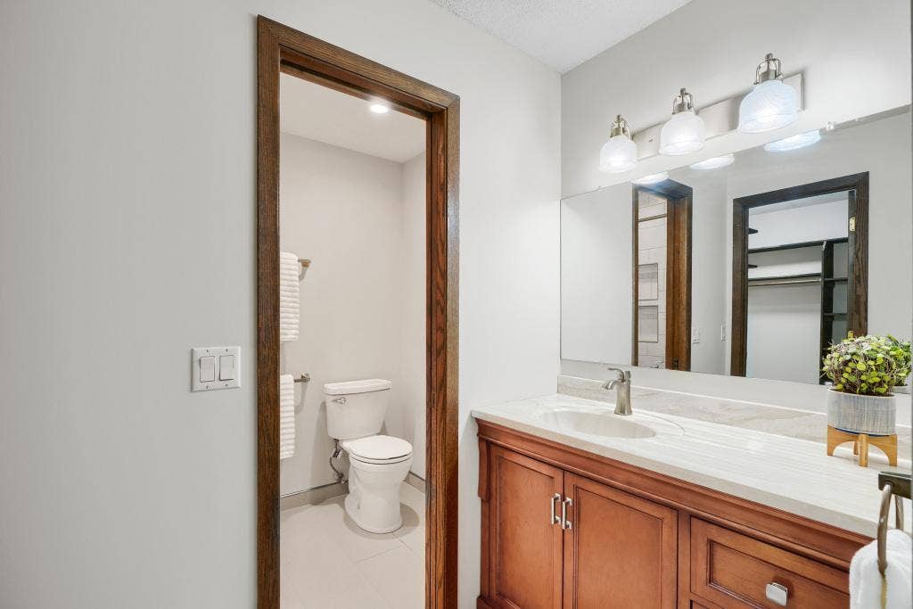 9600 Portland Avenue S, #317, Bloomington, MN 55420 Primary bathroom is beautifully updated! Nice vanity area and separate shower/toilet room.