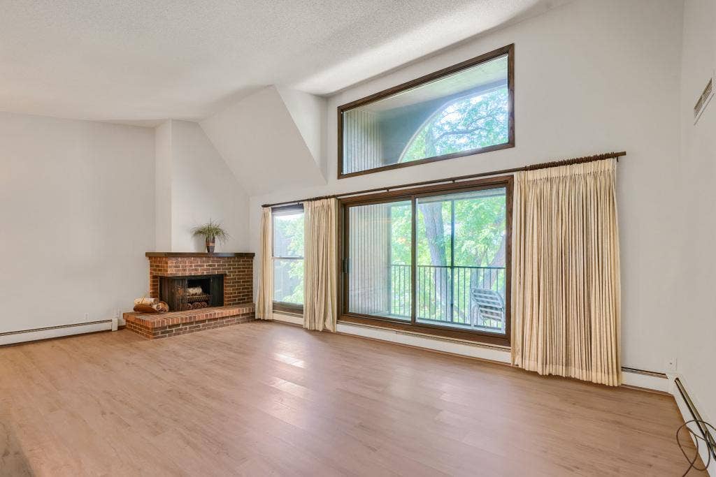 9600 Portland Avenue S, #317, Bloomington, MN 55420 Coveted 3rd floor location with vaulted ceilings and abundant windows to fill the space with natural light. Brand new flooring installed throughout home.