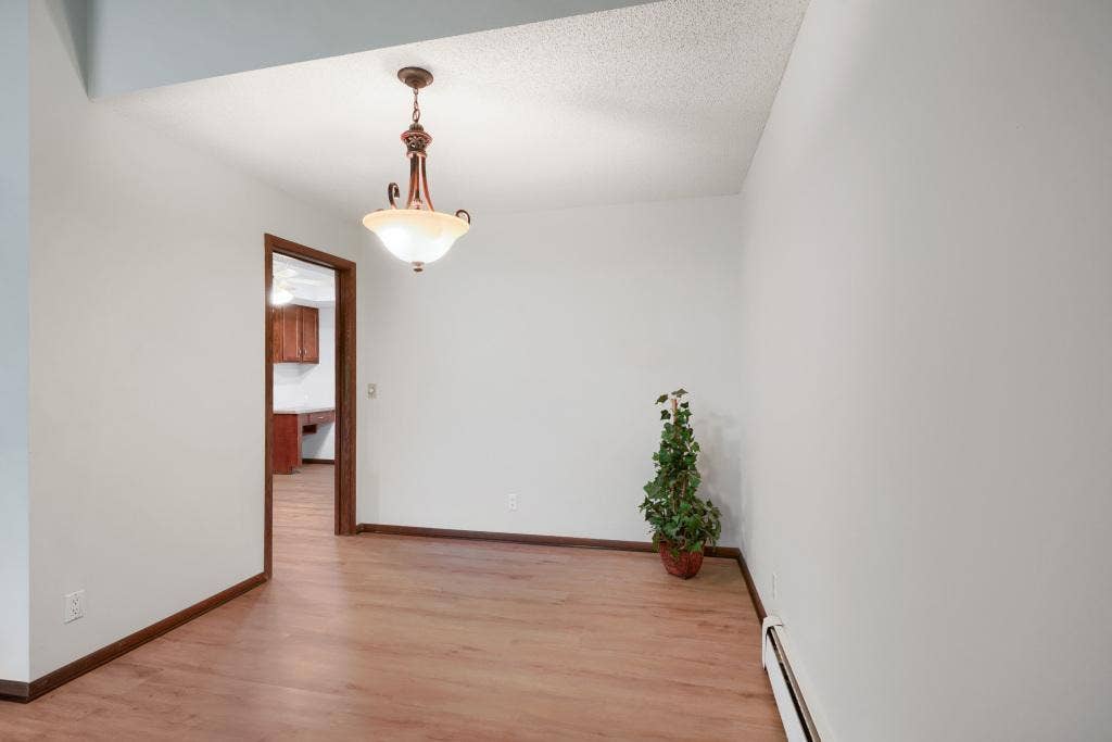 9600 Portland Avenue S, #317, Bloomington, MN 55420 Dining room leads into nice sized kitchen. Home is freshly painted with new flooring.