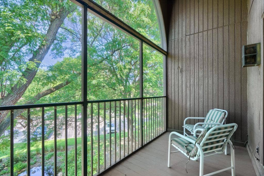 9600 Portland Avenue S, #317, Bloomington, MN 55420 An amazing feature to this condo - screened porch and generous seating area. Overlooks fountain and trees for a peaceful feeling.