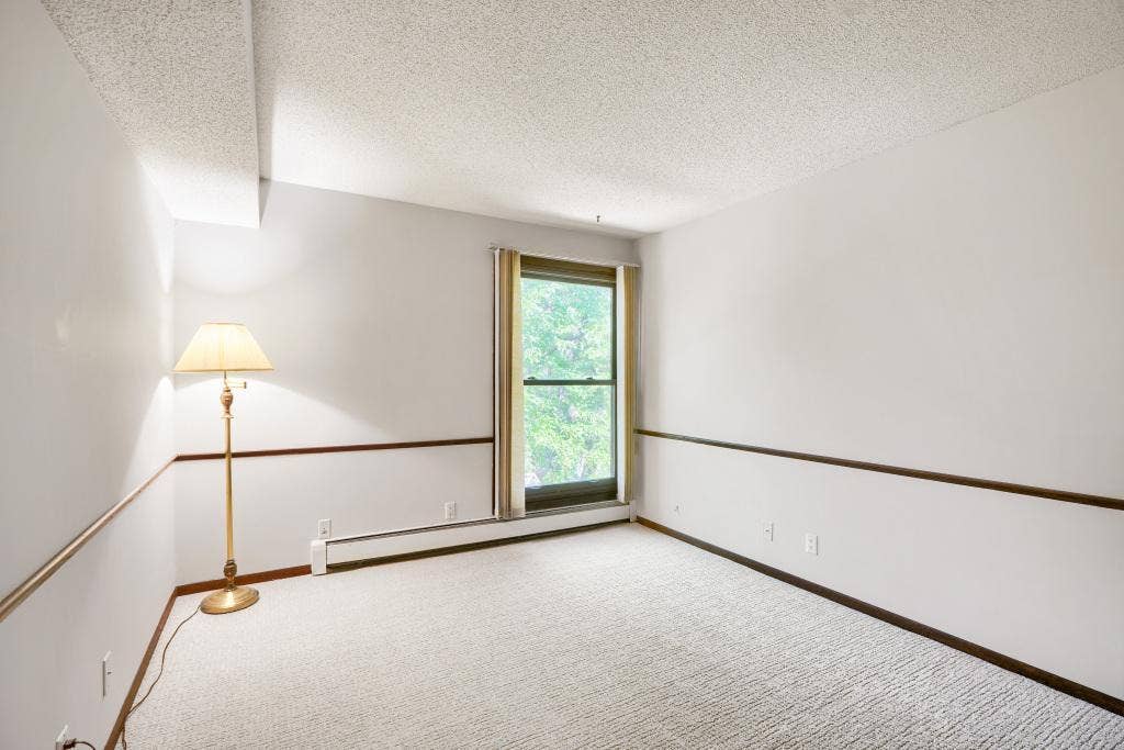 9600 Portland Avenue S, #317, Bloomington, MN 55420 2nd bedroom makes a perfect guest room, office, den or craft room. New carpet and nice closet.