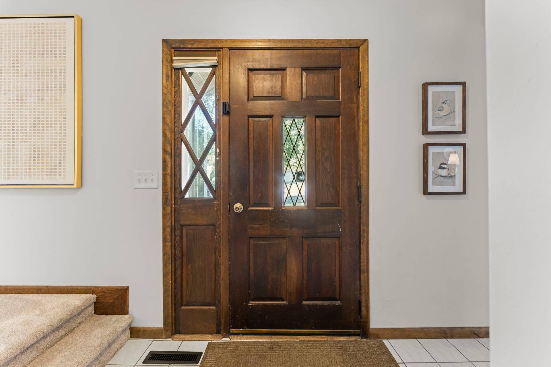 7181 Steepleview Road, Woodbury, MN 55125 The large entryway greets guests with plenty of space and an inviting introduction to the home.