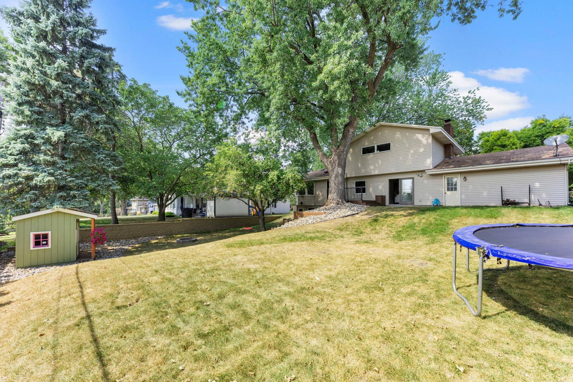 7181 Steepleview Road, Woodbury, MN 55125 Another view of the spacious backyard.