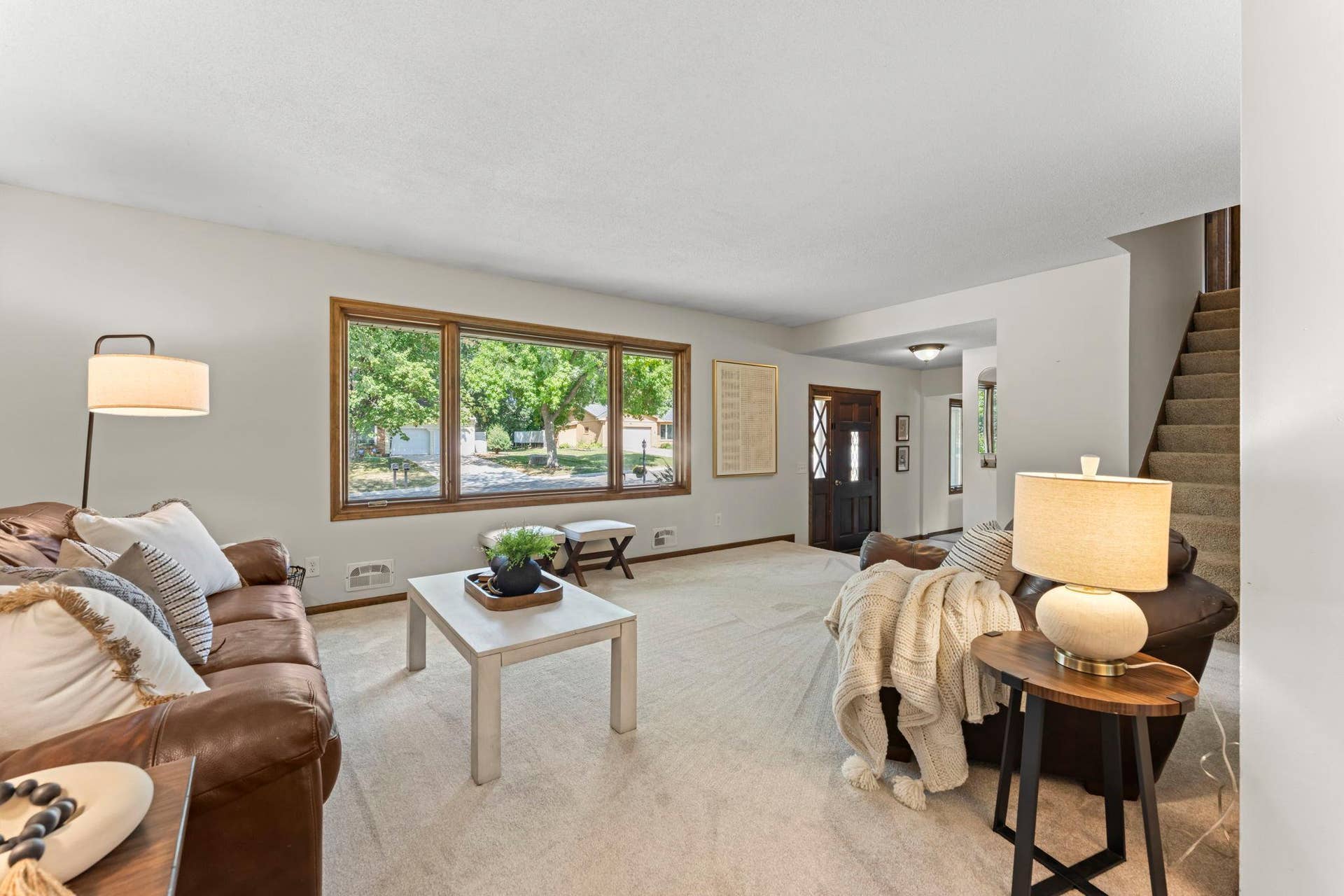 7181 Steepleview Road, Woodbury, MN 55125 Each room features large windows allowing for an abundance of natural sunlight to flow through this home.