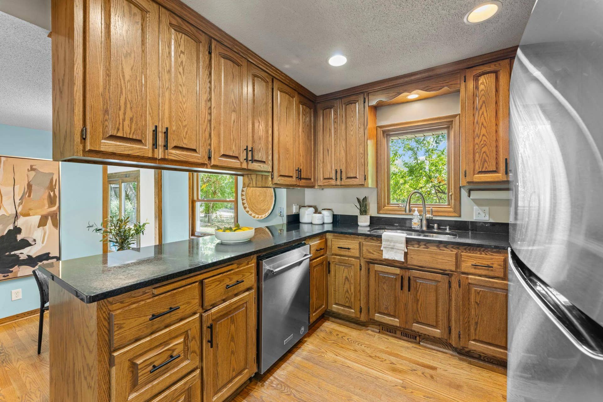 7181 Steepleview Road, Woodbury, MN 55125 The kitchen looks right into the informal dining room space.