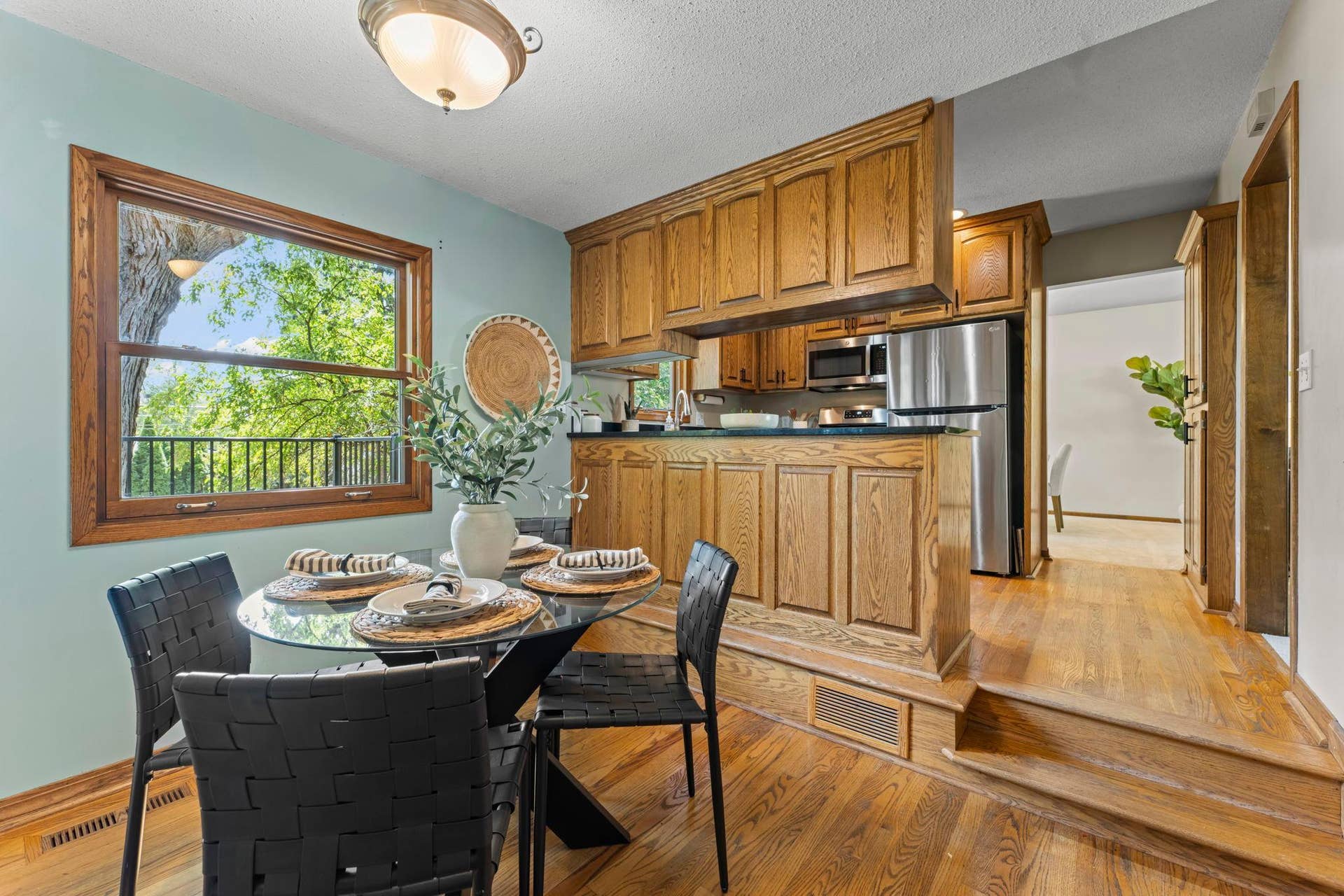 7181 Steepleview Road, Woodbury, MN 55125 Enjoy morning coffee or tea in the charming informal dining room.