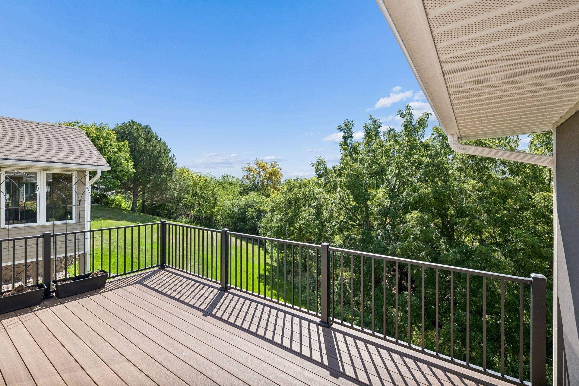 7063 Oak Pointe Curve, Bloomington, MN 55438 New Composite deck is 6 feet wider with tranquil views