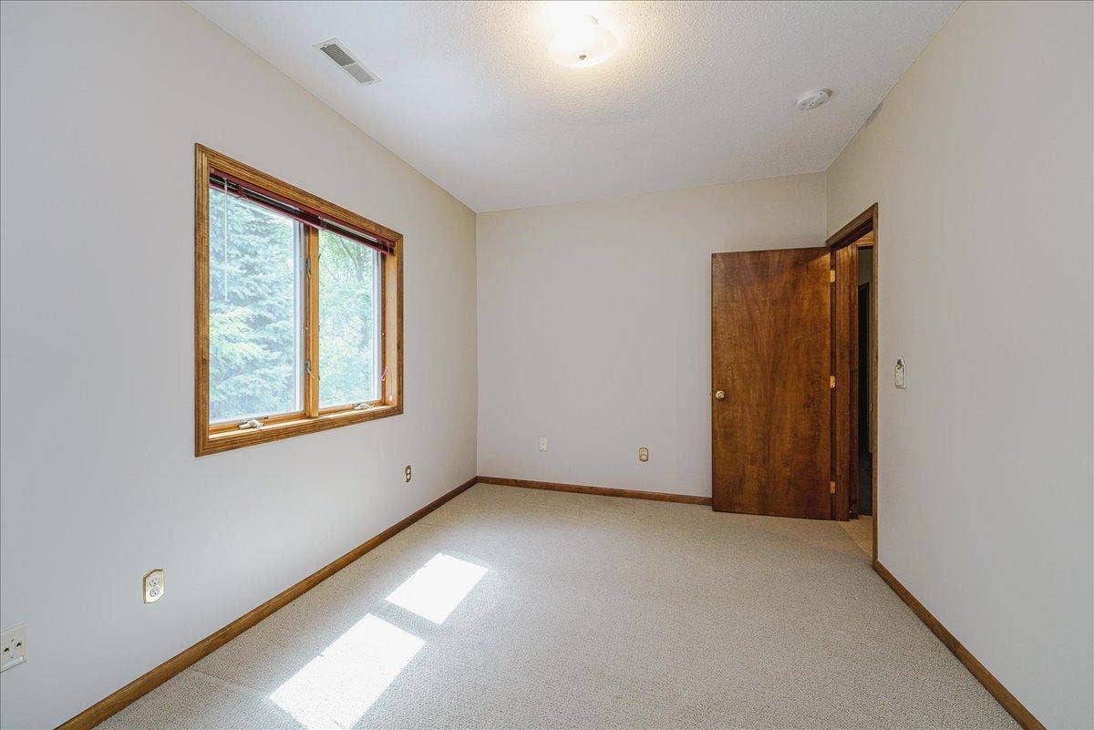 1060 Dennis Street S, Maplewood, MN 55119 57-Bedroom 4.jpg