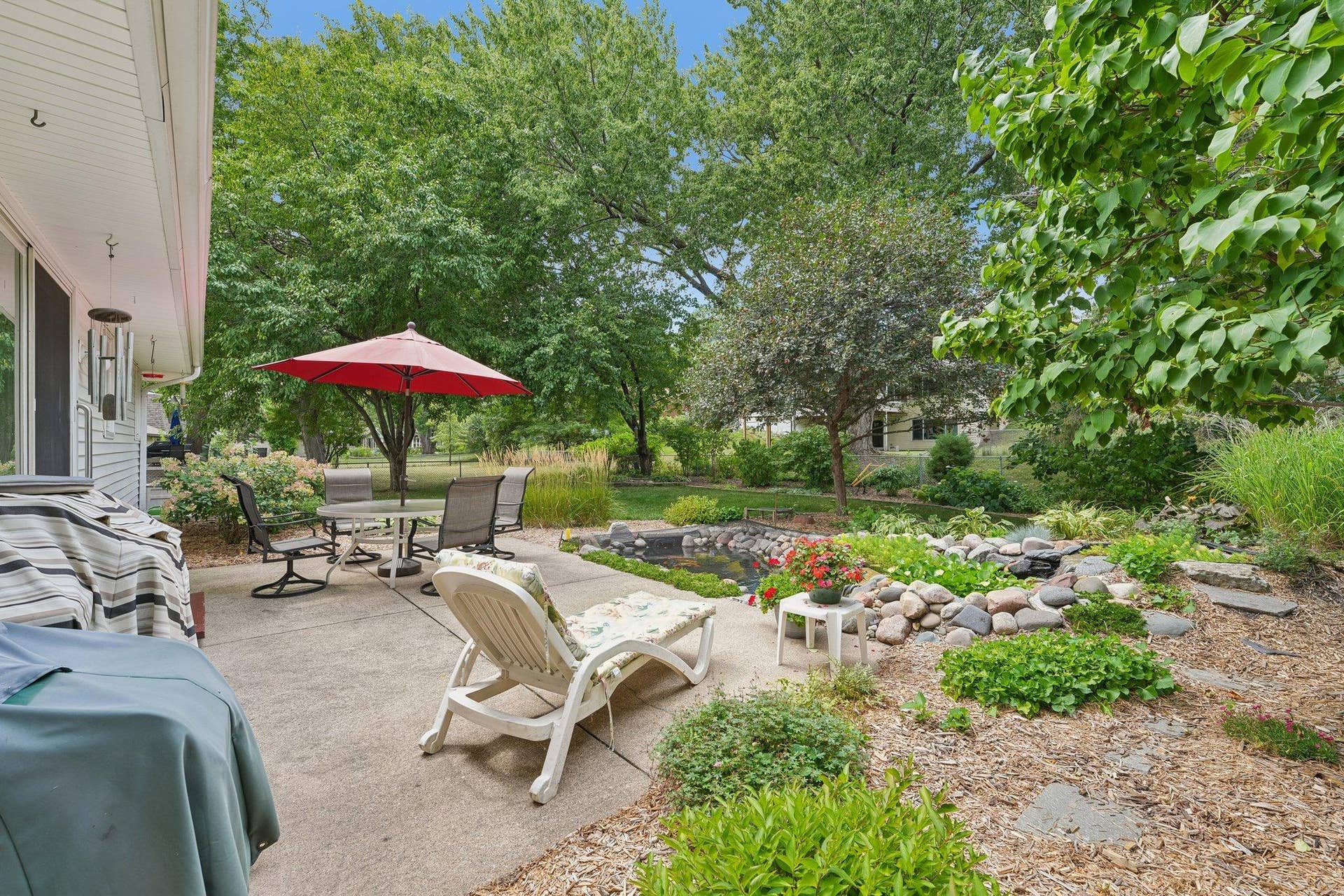 View of fenced in backyard patio