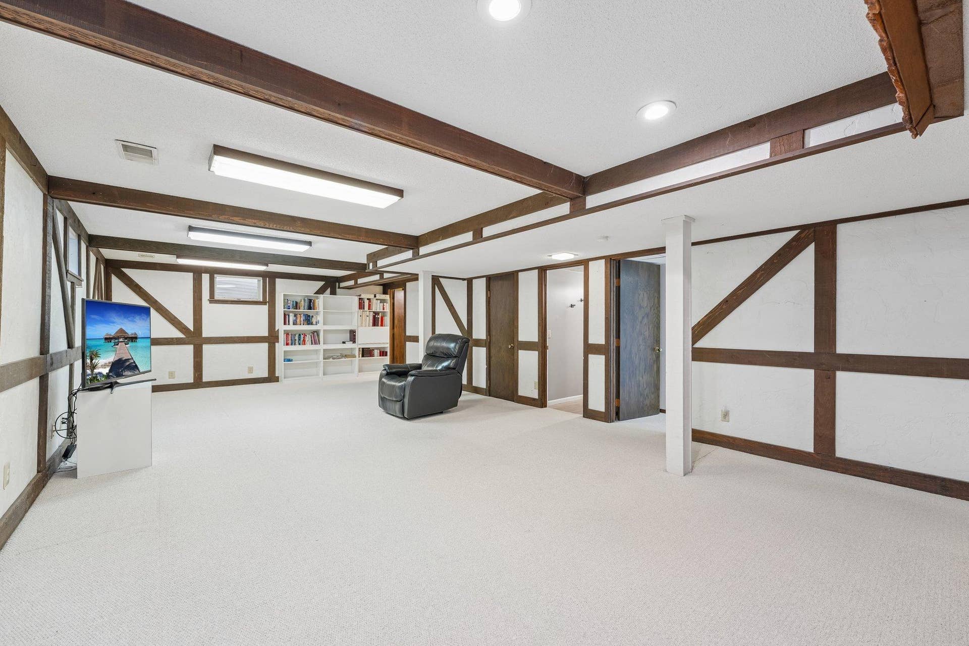 Large lower level area. Big enough for a TV view area and ping pong or a pool table
