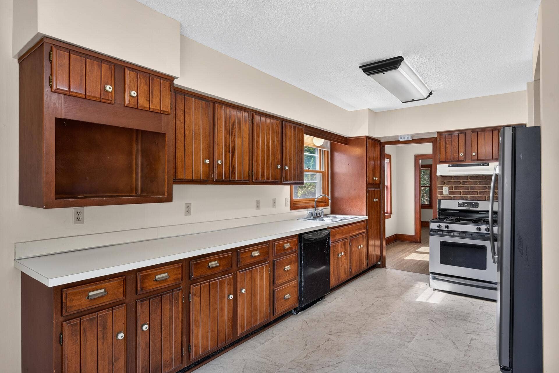 4242 Thomas Avenue N, 79, Minneapolis, MN 55412 Original wood work and bronze labels on the cabinetry