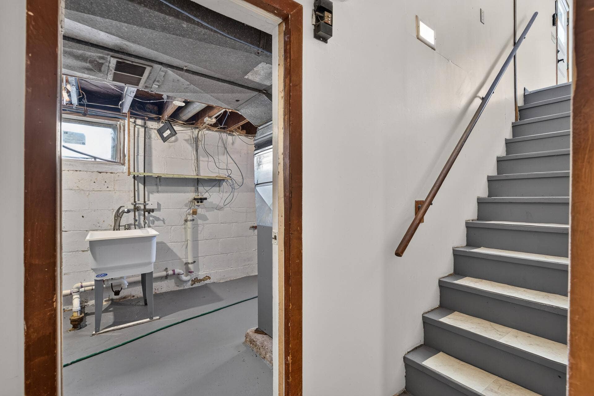 4242 Thomas Avenue N, 79, Minneapolis, MN 55412 Entering the basement from the stairs off of the kitchen