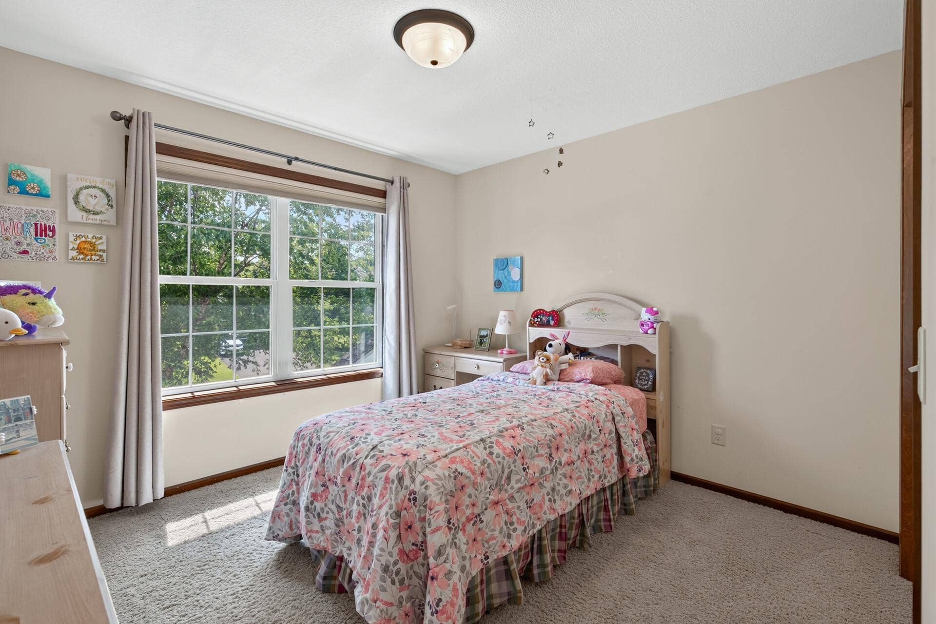 10548 Noble Circle N, Brooklyn Park, MN 55443 Bedroom 2: Spacious upper-level bedroom with generous closet space.
