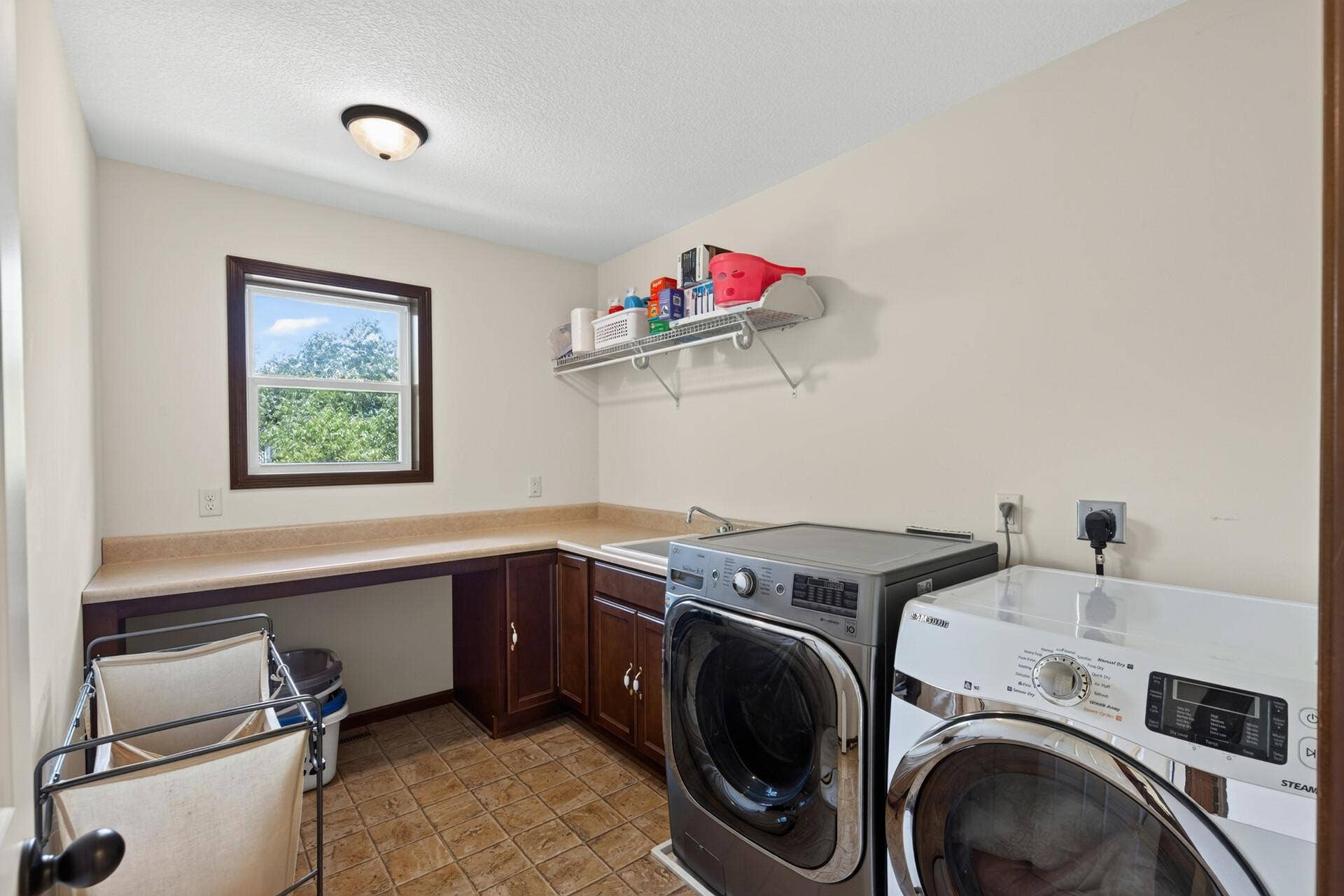 10548 Noble Circle N, Brooklyn Park, MN 55443 Laundry Room: Large upper-level laundry room offering excellent space and convenience.