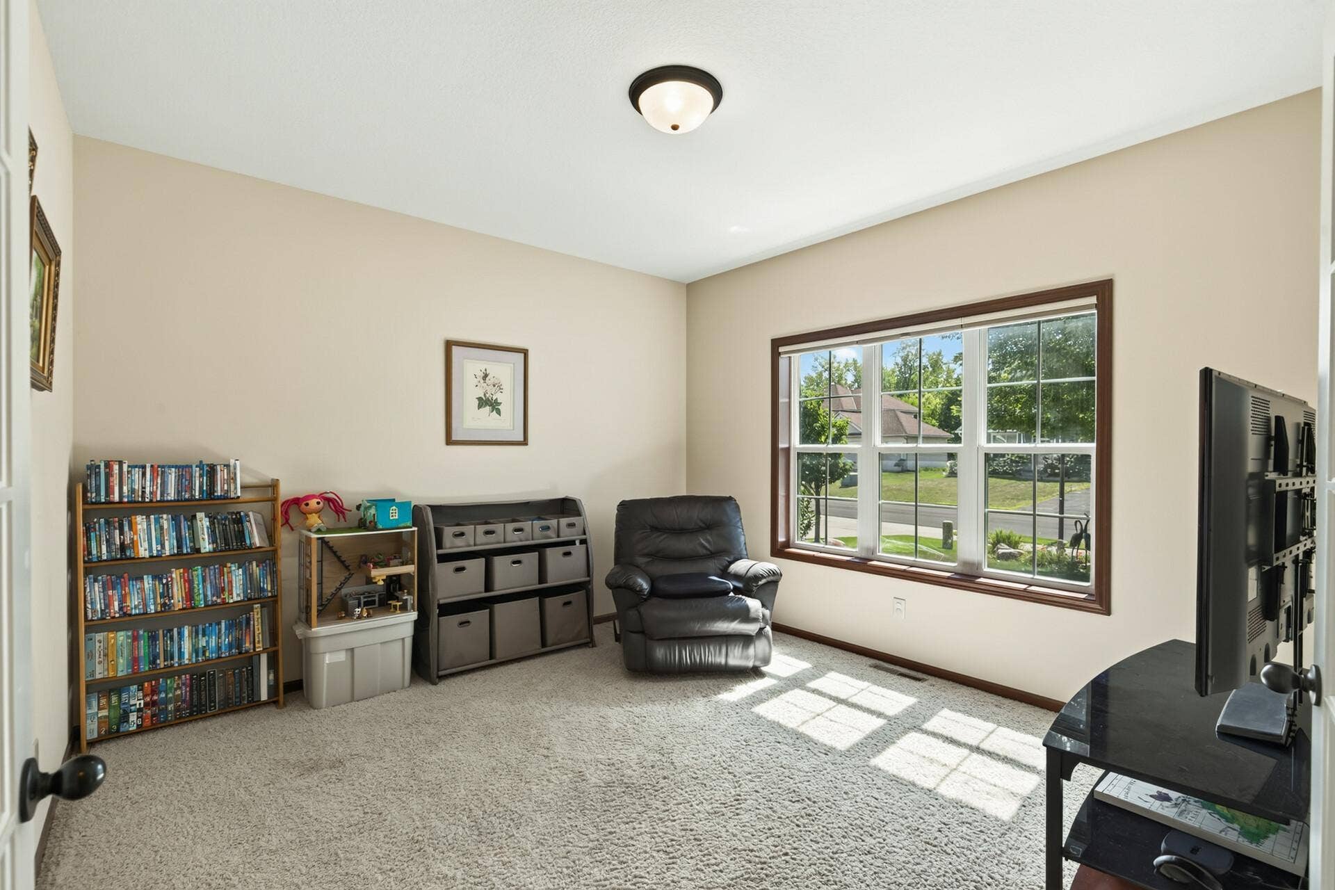 10548 Noble Circle N, Brooklyn Park, MN 55443 Den: Private den with French doors, perfect for a home office or flex space.