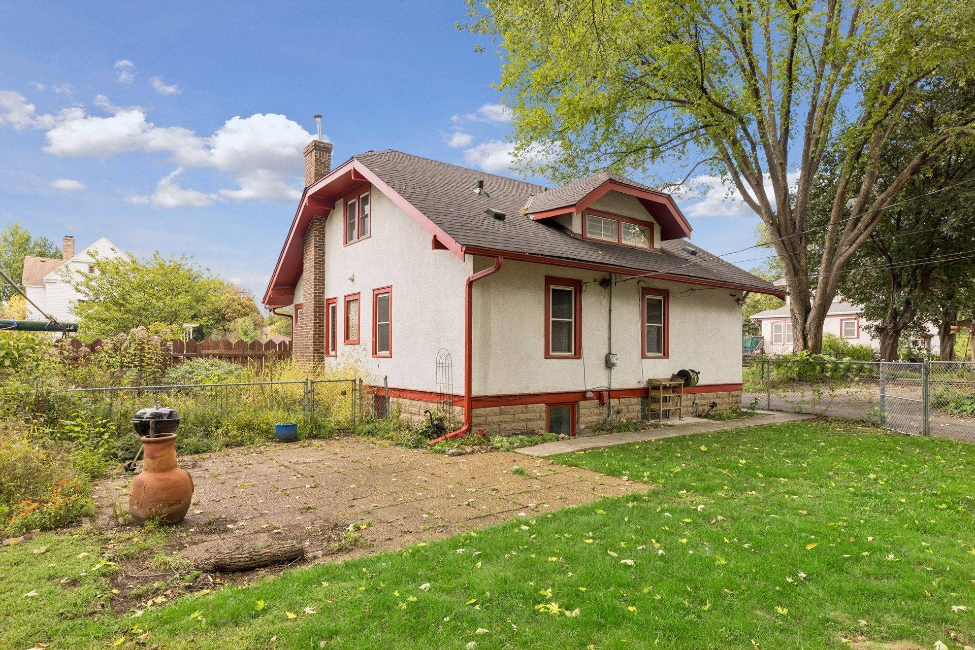 Alternate view of the backyard and exterior of the home.