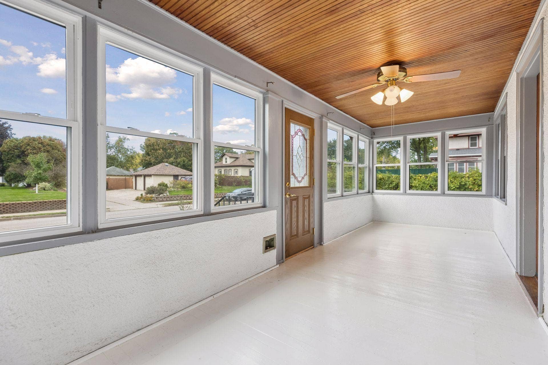 Step inside to the bright west-facing porch.