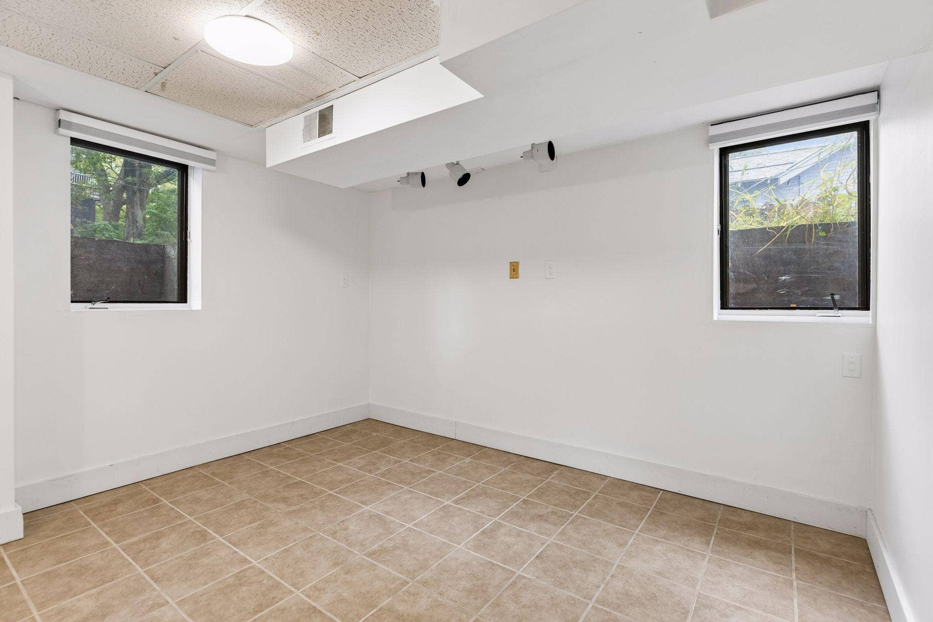 The fourth bedroom is in the basement.