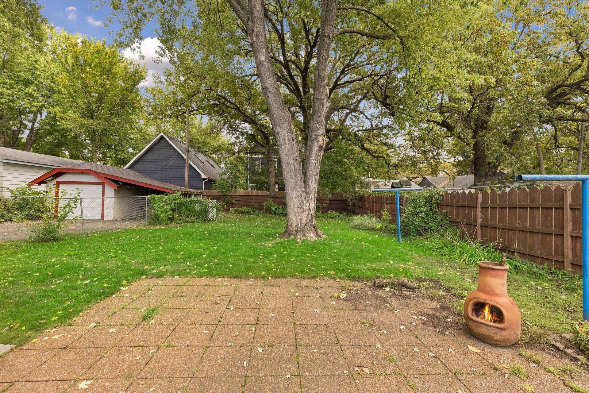 The backyard features a patio.