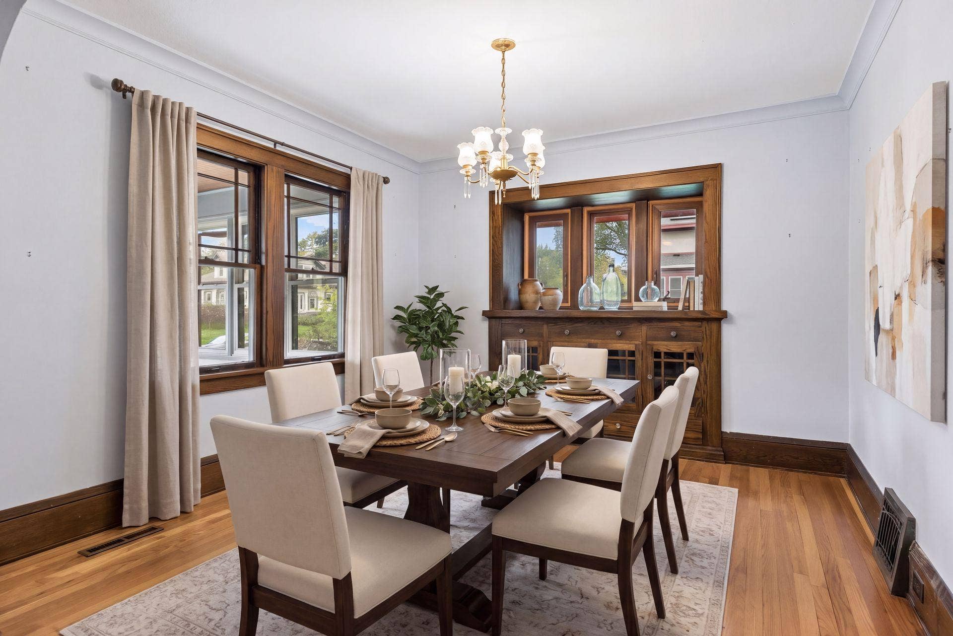 Dining room virtually staged using AI - please refer to floorplan for room dimensions and sizing.